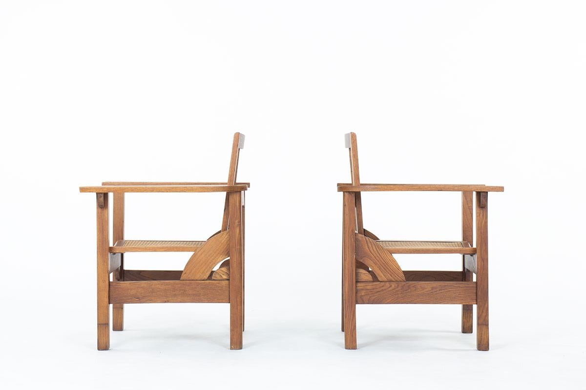 Set of 2 Hendaye armchairs by Pierre Dariel in oak and caned, 1930 In Good Condition In JASSANS-RIOTTIER, FR