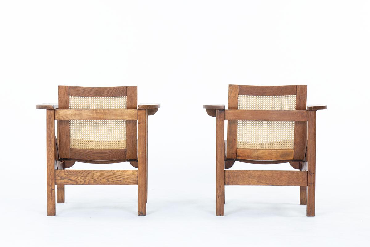 20th Century Set of 2 Hendaye armchairs by Pierre Dariel in oak and caned, 1930