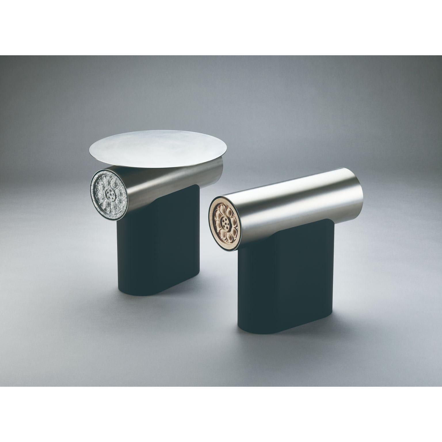 Set of 2 Heritage Gwol stool and table by Lee Jung Hoon
Dimensions: D46 x W44 x H45cm and D46 x W16.3 x H43.5cm
Materials: Stainless Steel, Steel, Granite, Maple.

The Heritage series, created by designer Lee Jung-hoon is a collection of
