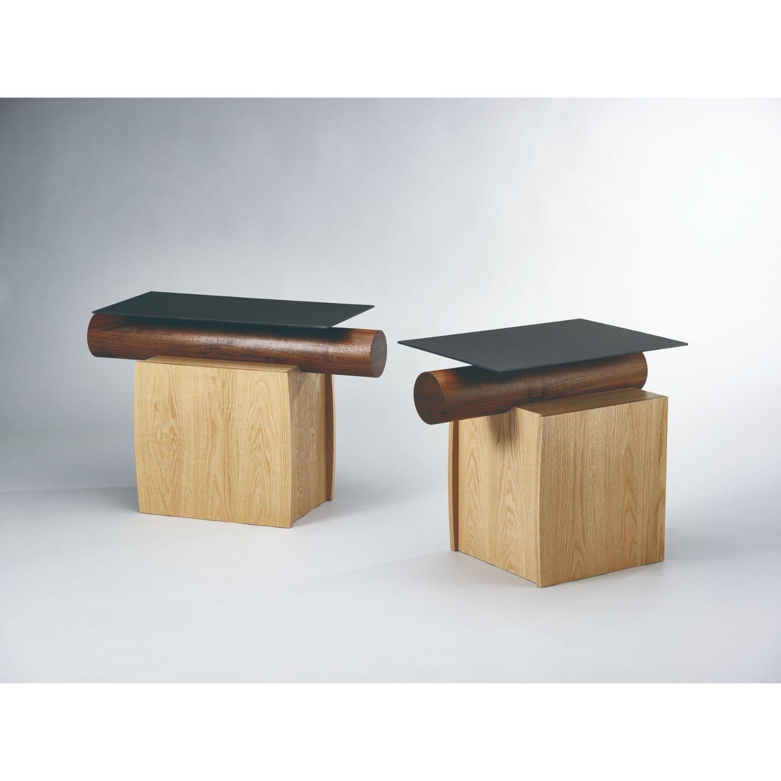 Set of 2 heritage side tables by Lee Jung Hoon
Dimensions: D80 x W33 x H52.4 cm
Materials: Red Oak, Walnut, Stainless steel, Corrosion

The Heritage series, created by designer Lee Jung-hoon is a collection of sculptural modern furniture. The