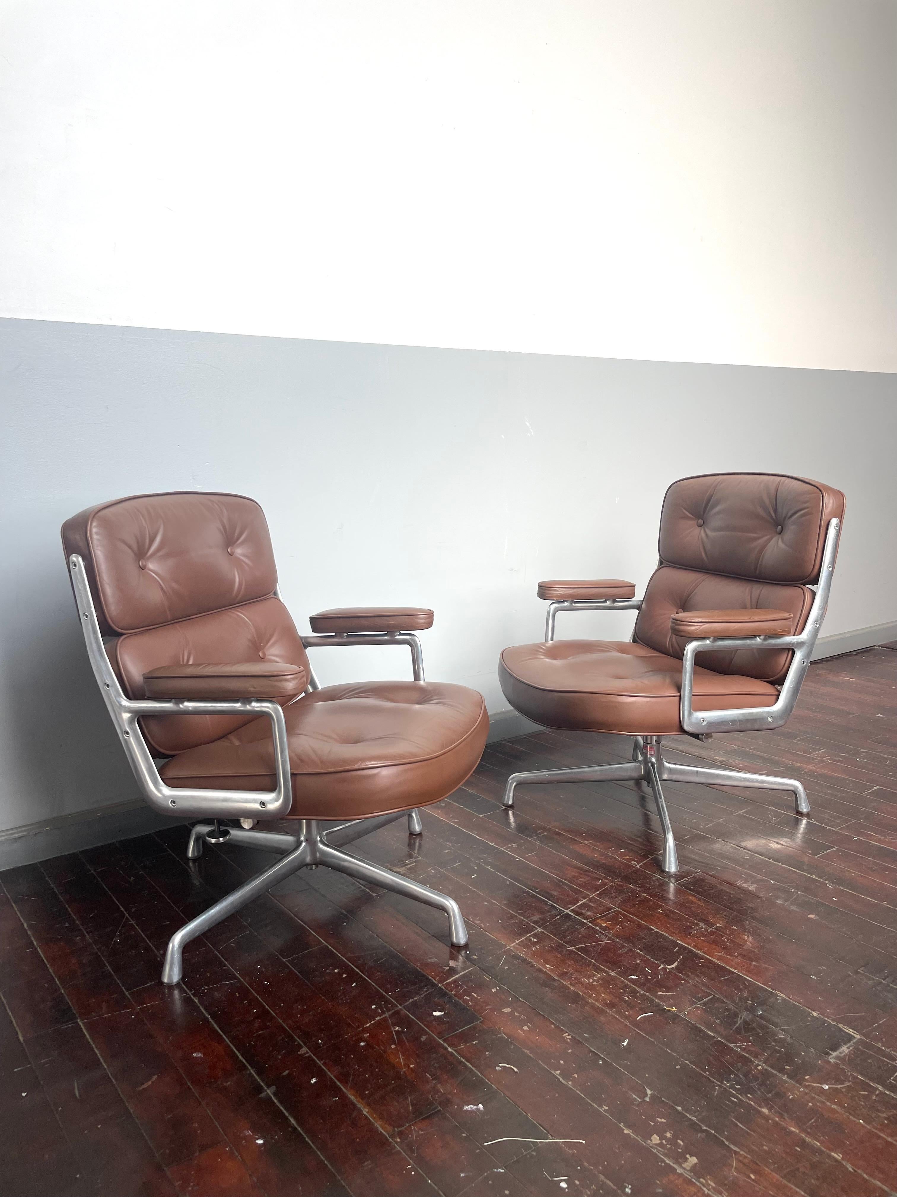 Rare find. 

Pair of 1979 Herman Miller Time Life Lobby Chairs in brown leather. 

Incredible character. Supreme comfort. 

Adjustable degree of recline. Adjustable seat height.

Chairs show some wear on the frame and leather. One replacement brown