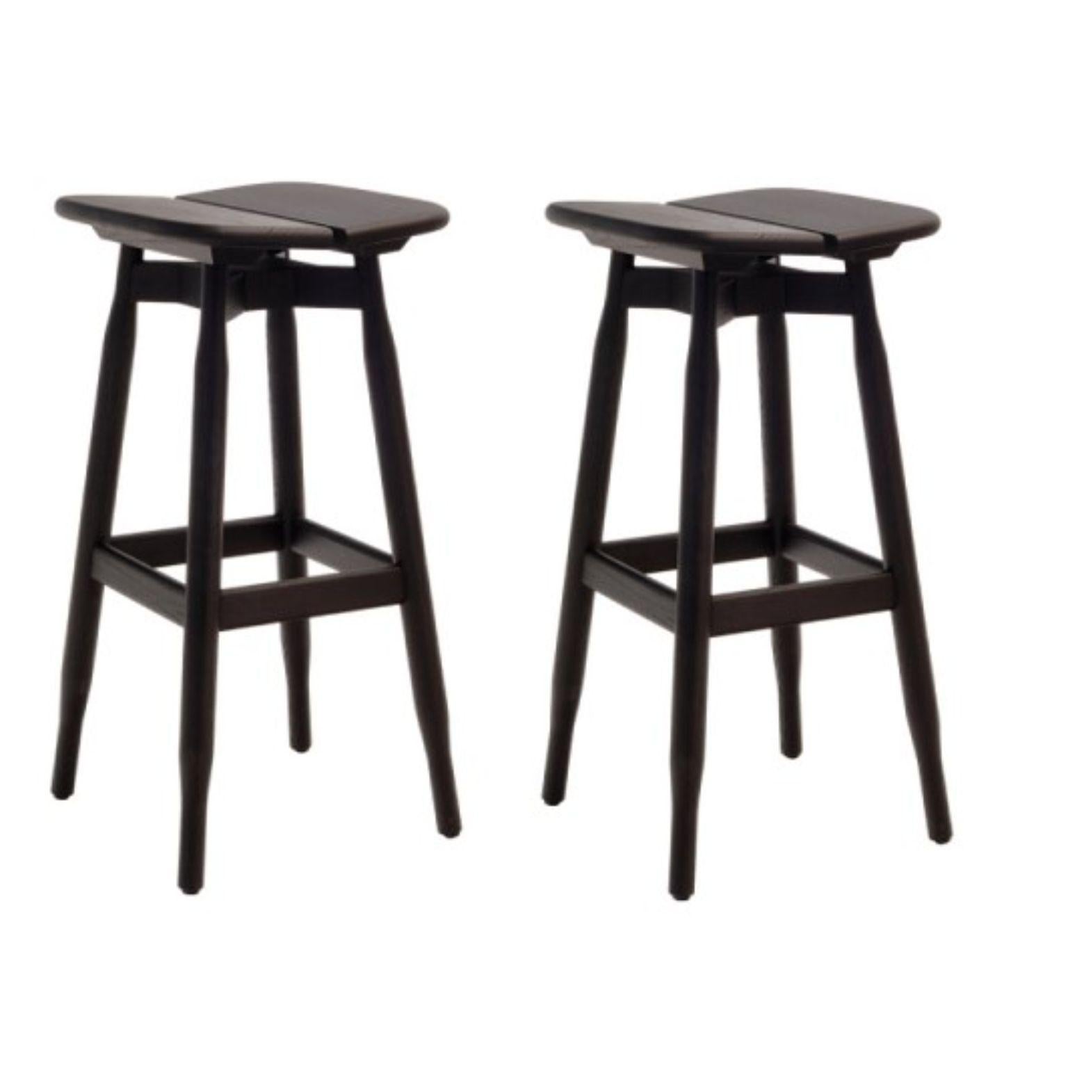 Set of 2 high black stained oak DOM stools by Marcos Zanuso Jr
Materials: High stool, structure, and seat in solid oak, natural varnished or black stained.
Technique: Lacquered metal. Natural or stained wood. 
Dimensions: D 38 x W 40 x H 74