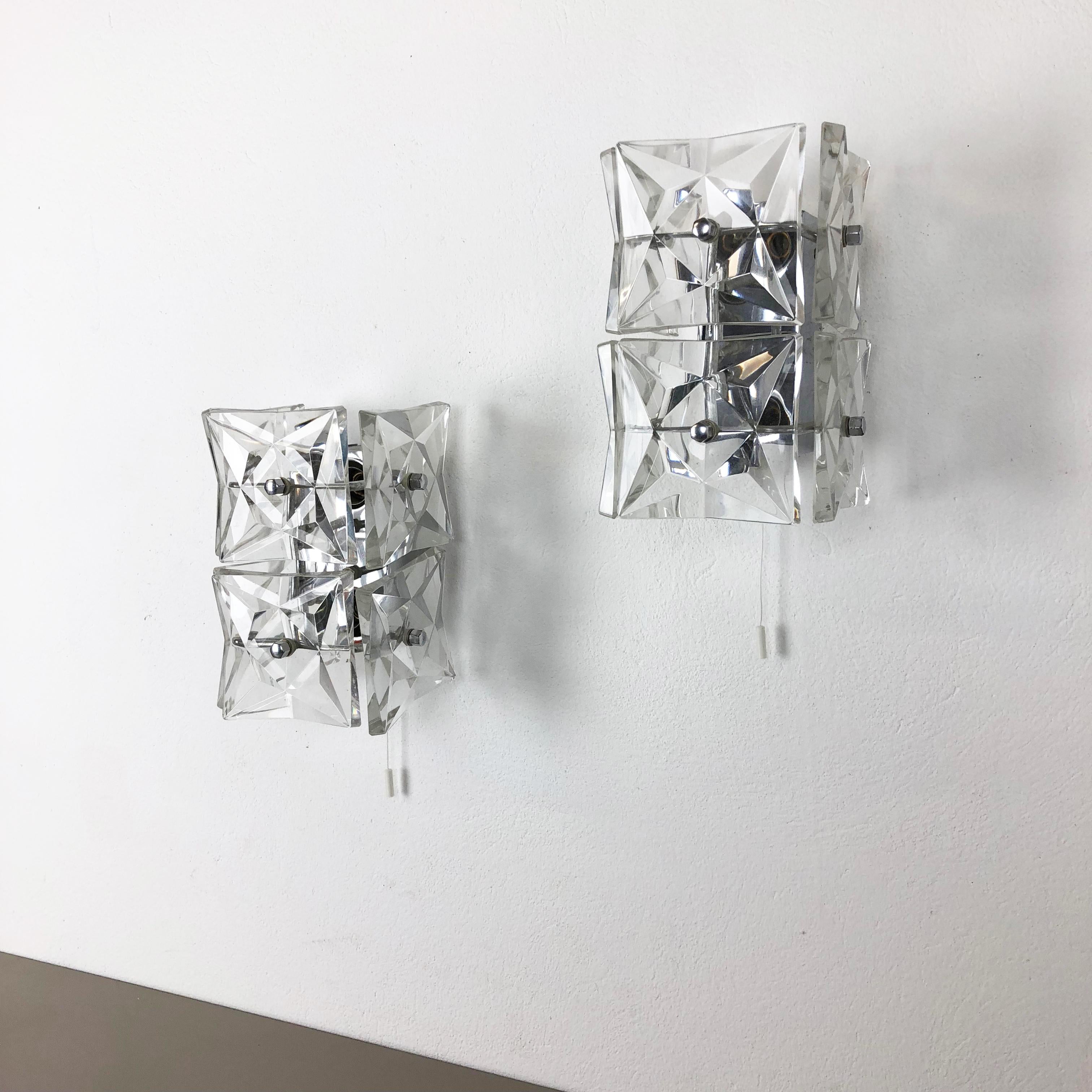Article:

Set of 2

Wall light sconces


Origin:

Germany


Producer:

Kinkeldey, Germany



Age:

1960s



This set of 2 modernist lights was produced by Kinkeldey, Bad Pyrmont in Germany in the 1960s. It is made from heavy
