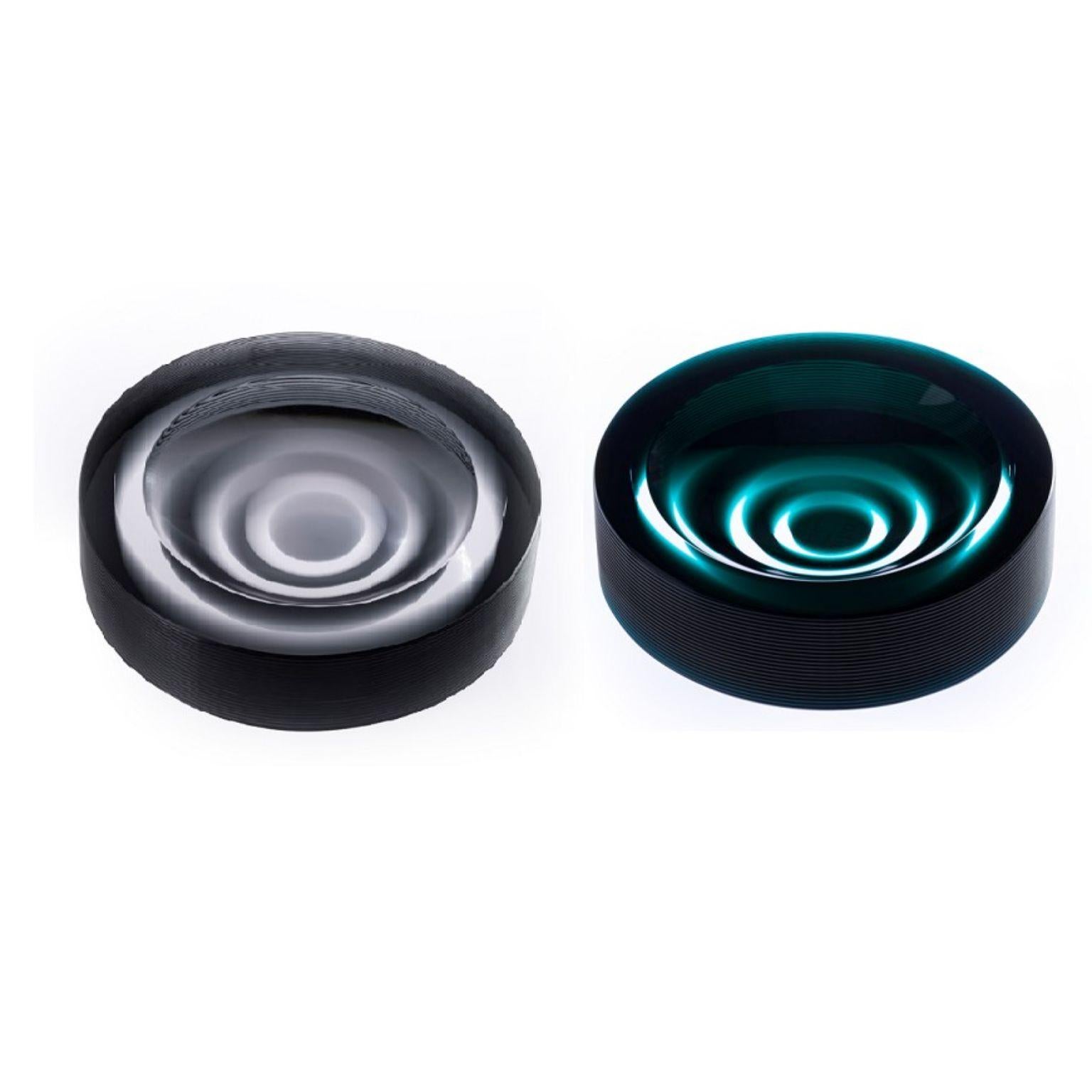 Set of 2 Incisioni Iridi Stripe Ashtrays by Purho
Dimensions: D14x H3.5 cm
Materials: Glass
Other colours and dimensions are available.

Purho is a new protagonist of made in Italy design, a work of synthesis, a research that has lasted for