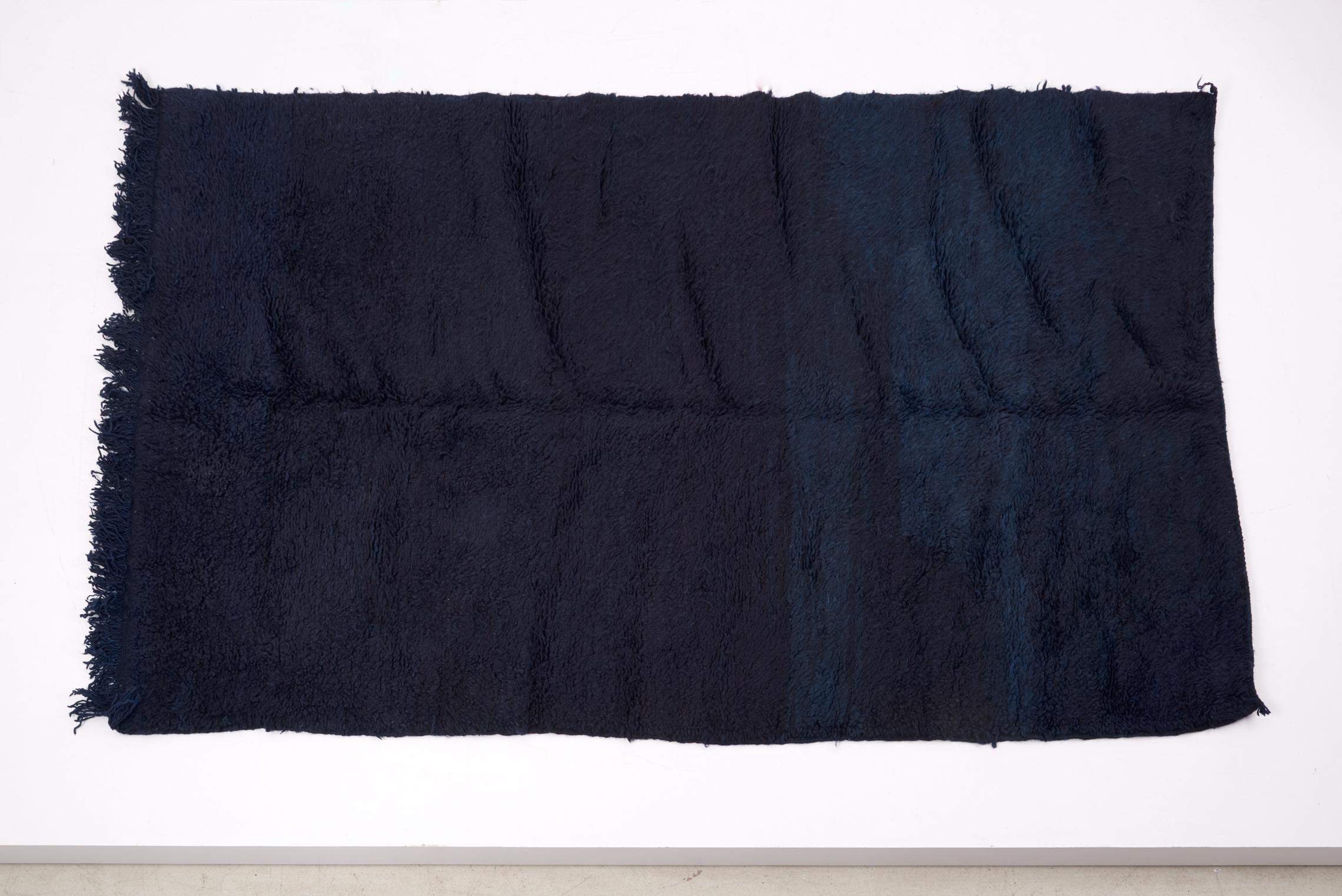 Pair of ink blue Mrirt carpets in hand dyed wool, late 20th century. Measures: 150 x 250 cm.