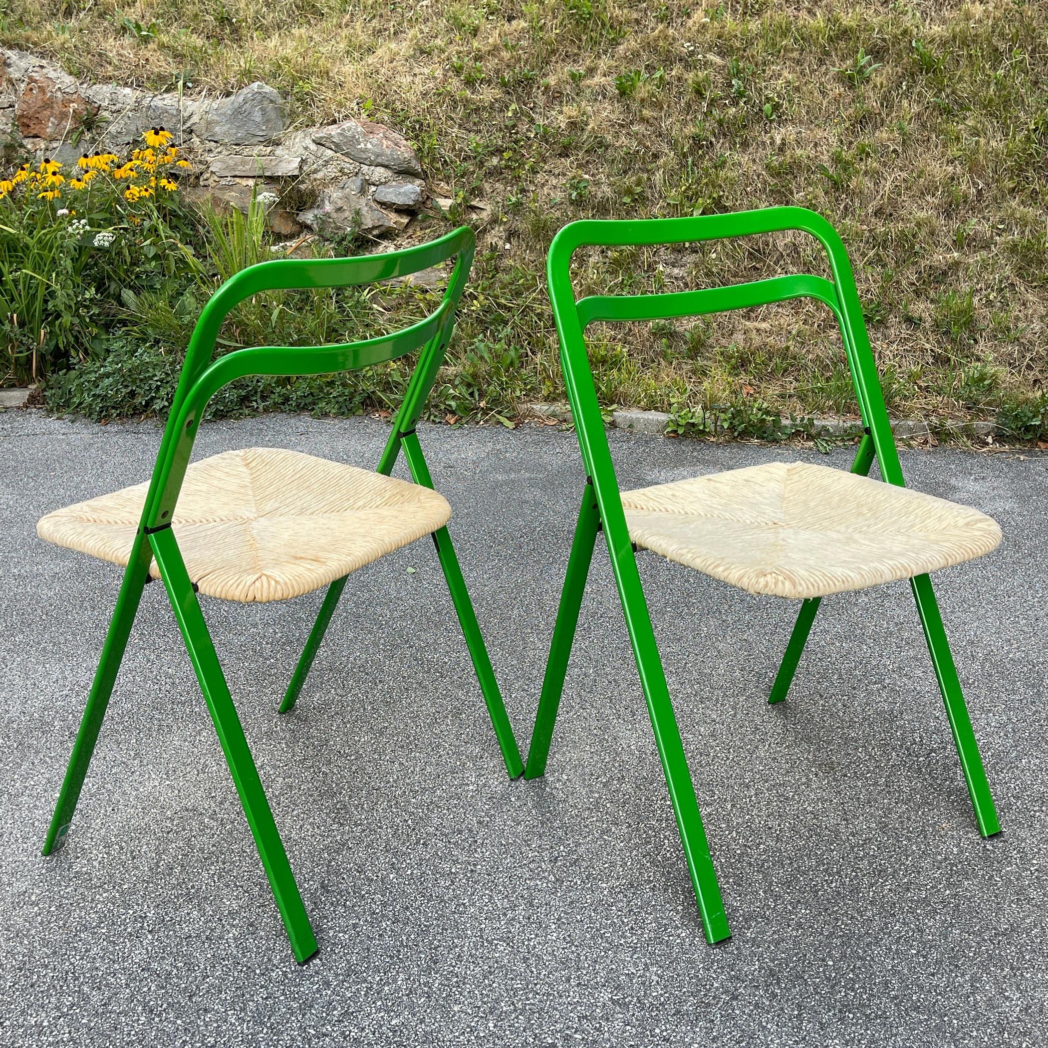 The amazing pair of mid-century folding chairs. This fantastic set was designed by Giorgio Cattelan and manufactured by Cidue in Italy in the 1970s. These chairs are a perfect example of mid-century design, very elegant in their simple lines and