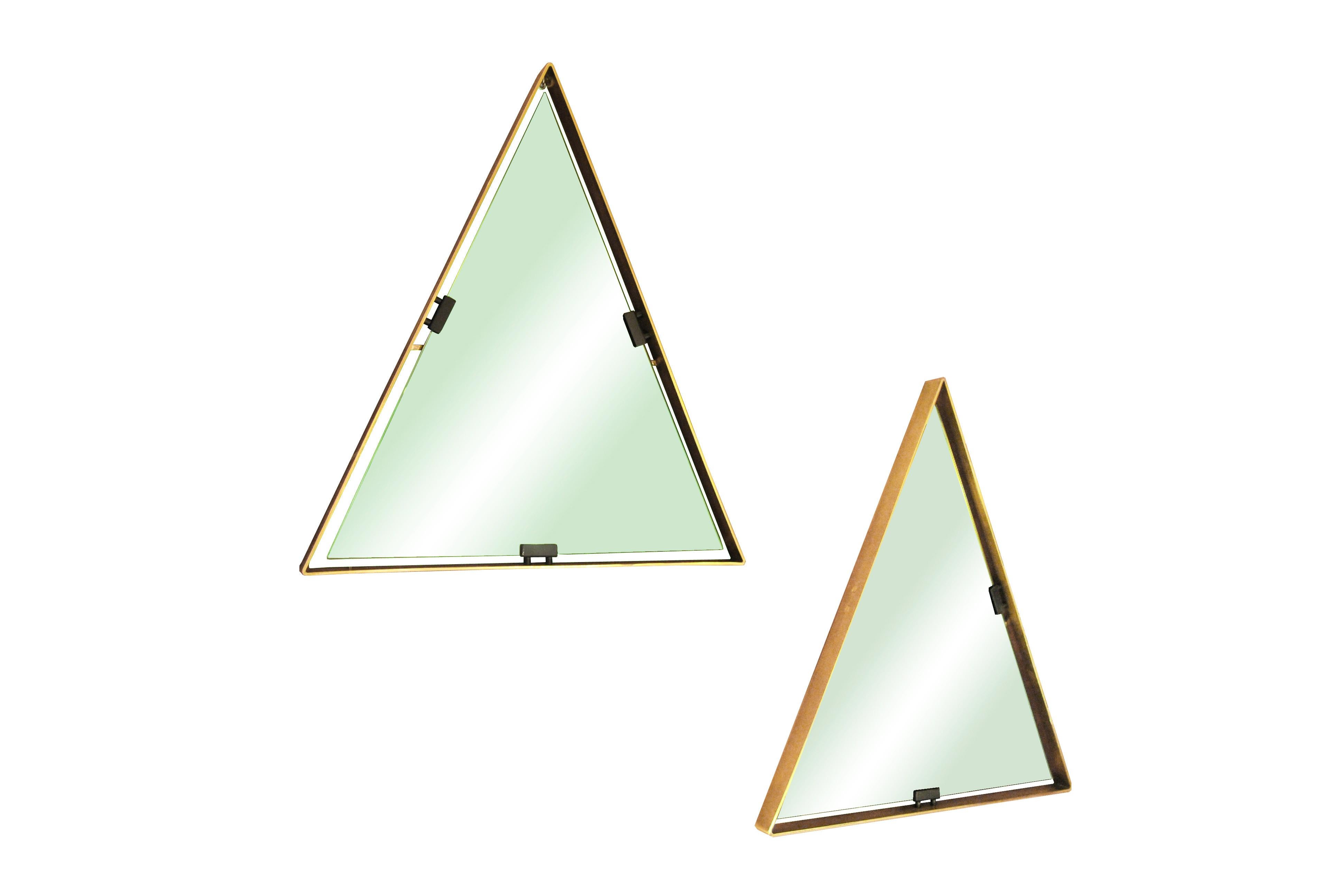 Set of 2 triangular mirrors with structure in brass and green smoked glass designed by Cellule Creative Studio for Misia Arte. 

Misia Arte is an historic Italian gallery in business for 40 years, always active in the design and decorative arts