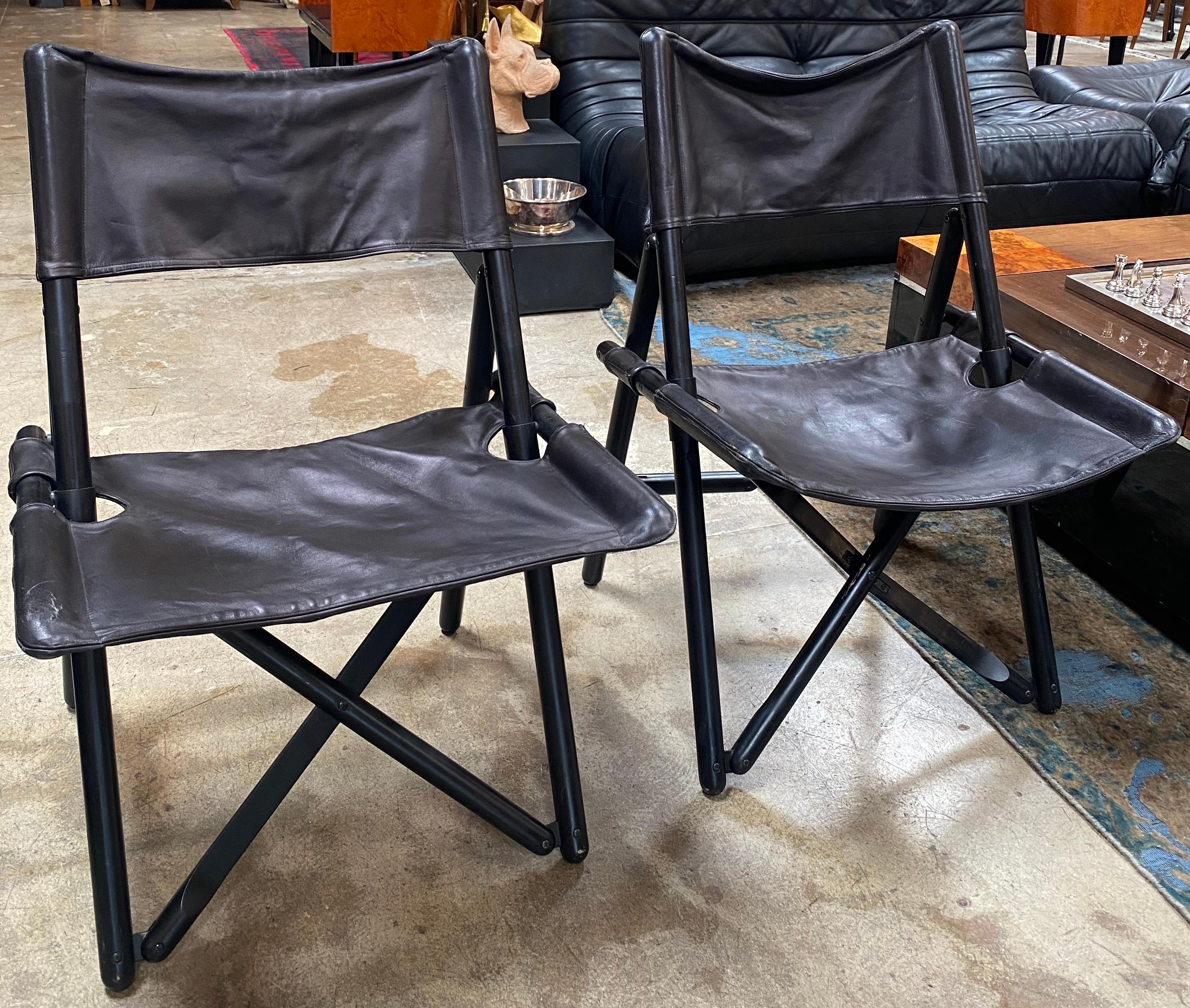 Beautiful pair of 2 Italian mid century side chairs made with wood and leather. The chairs were made in Italy 1960s circa
The conditions of the chairs are vintage and presents minor damage. These chairs, with their organic shapes, are an elegant