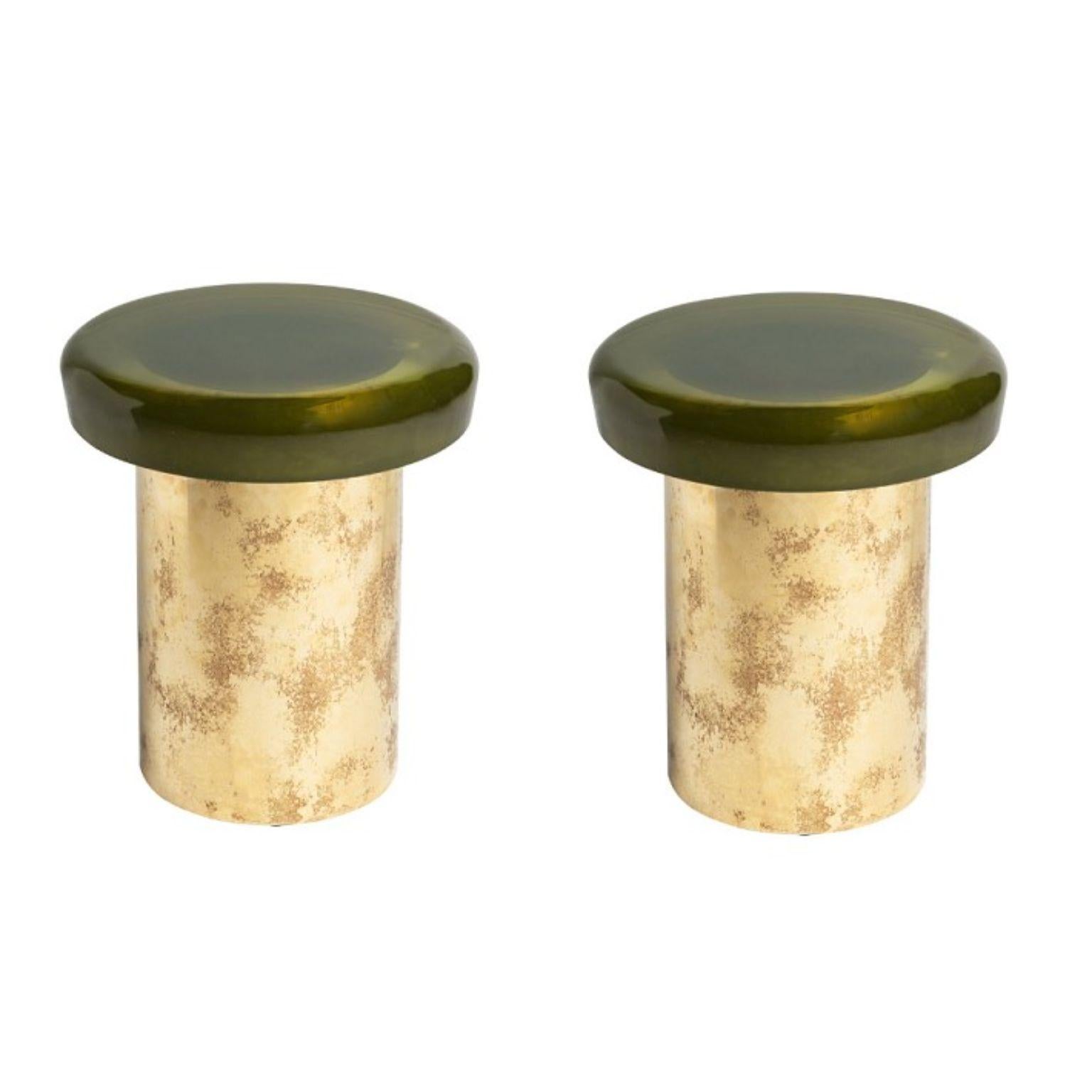 Set of 2 jade stools by Draga & Aurel
Dimensions: W 40, D 40, H 46, top Ø 40 cm
Materials: Resin and bronze

Formed from a combination of reflective resin and solid brass, the Jade coffee tables look like precious gems. The surface is made by