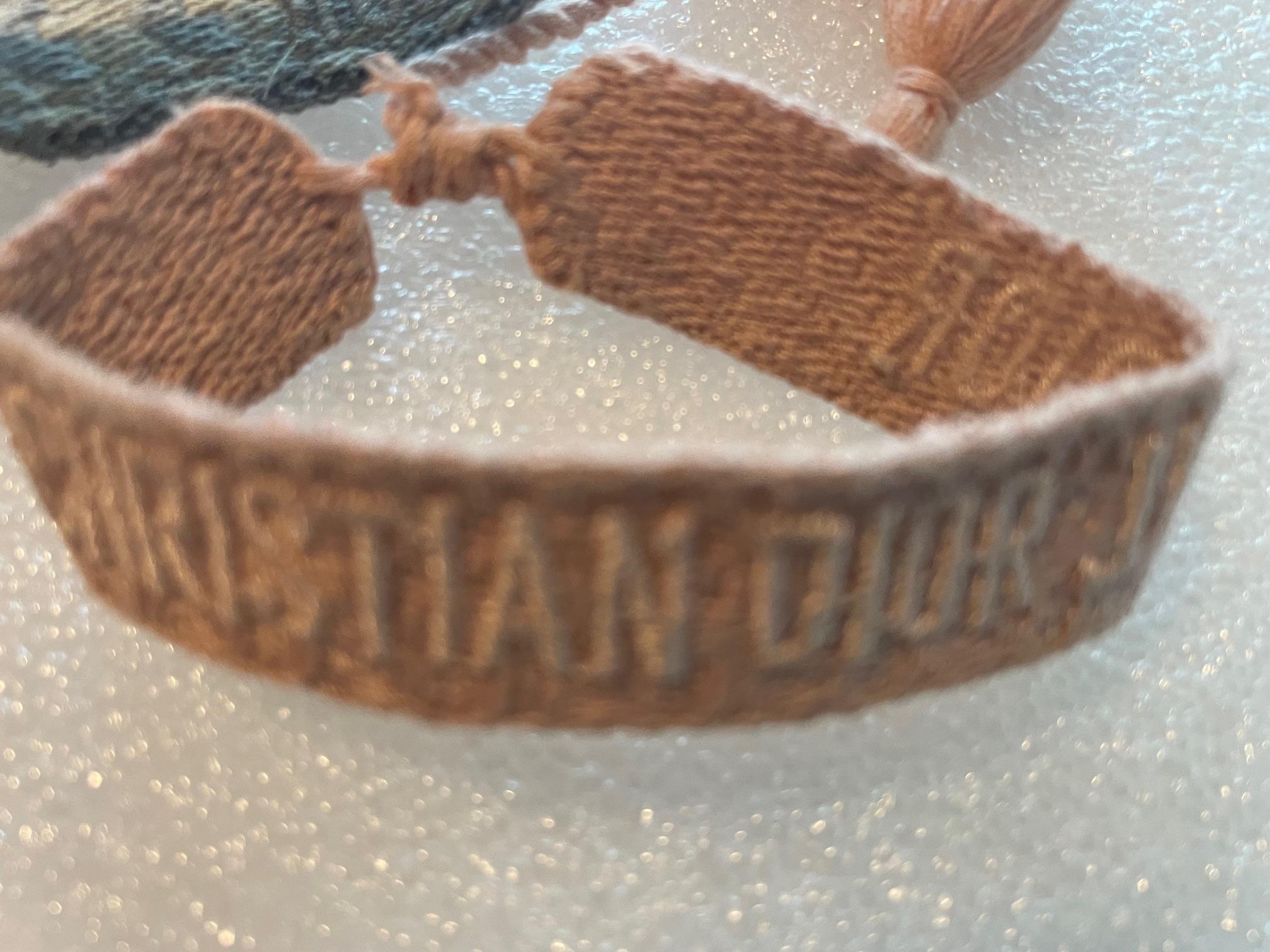 Set of 2 j'Adior bracelets by Christian Dior in nude cotton, which was brought up to date in the 2018 fashion show, friendship bracelet that recalls the Bohemian years.
