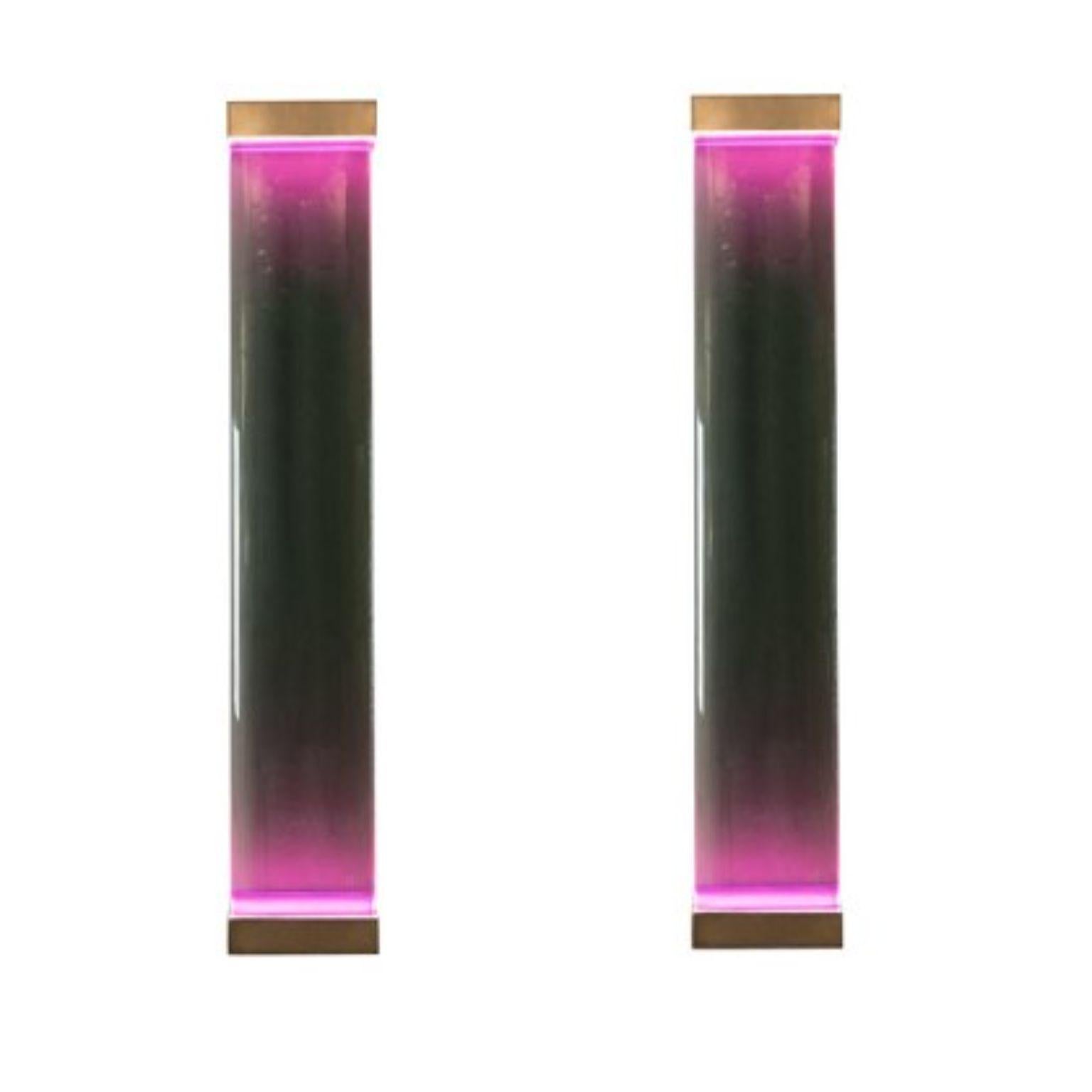 Set of 2 Jud Wall Lamps by Draga & Aurel
Dimensions: W 23, D 10, H 131.
Materials: Resin and brass

All our lamps can be wired according to each country. If sold to the USA it will be wired for the USA for instance.

Inspired by minimalism, the Jud