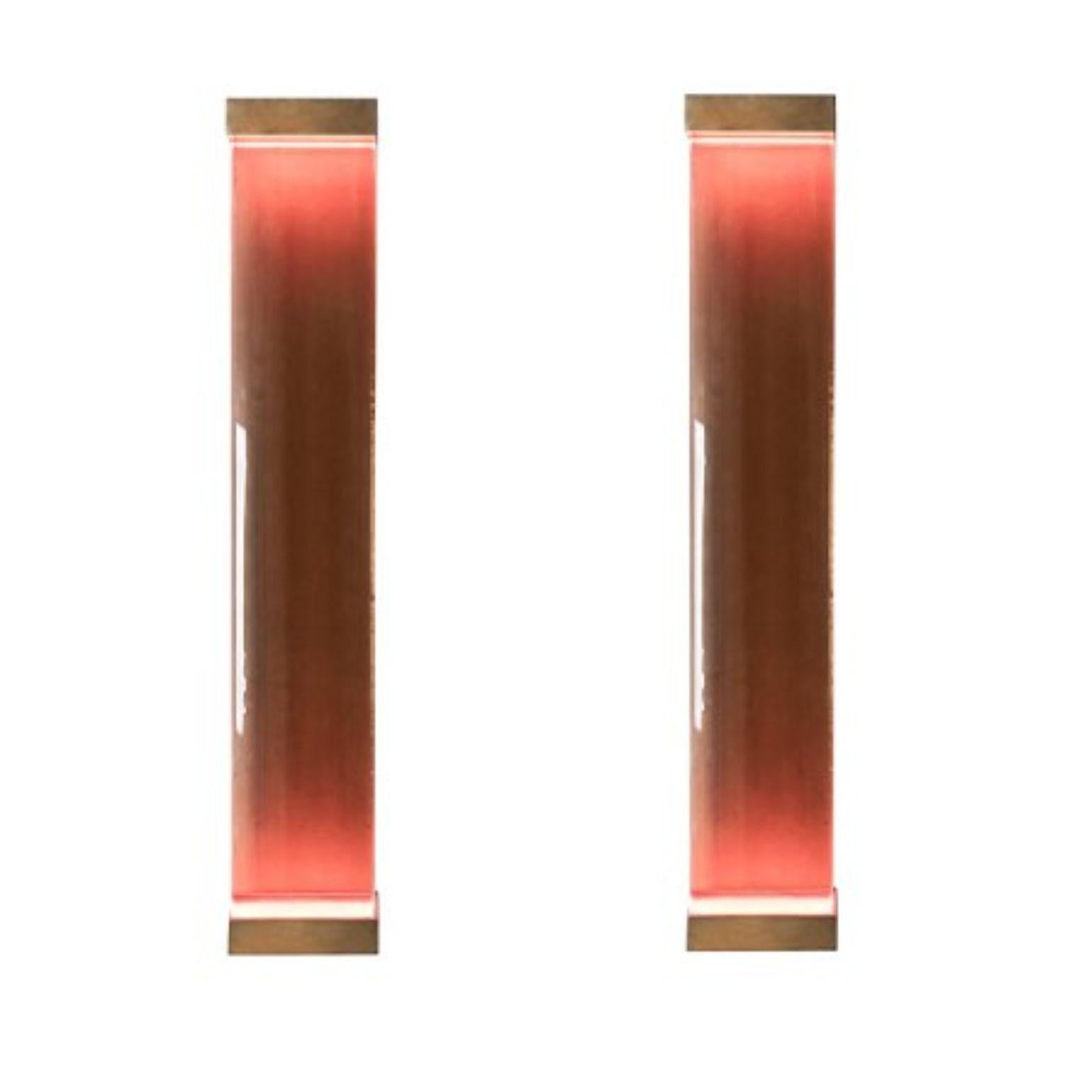 Set of 2 Jud wall lamps by Draga & Aurel
Dimensions: W 23, D 10, H 131.
Materials: resin and brass

All our lamps can be wired according to each country. If sold to the USA it will be wired for the USA for instance.

Inspired by minimalism,
