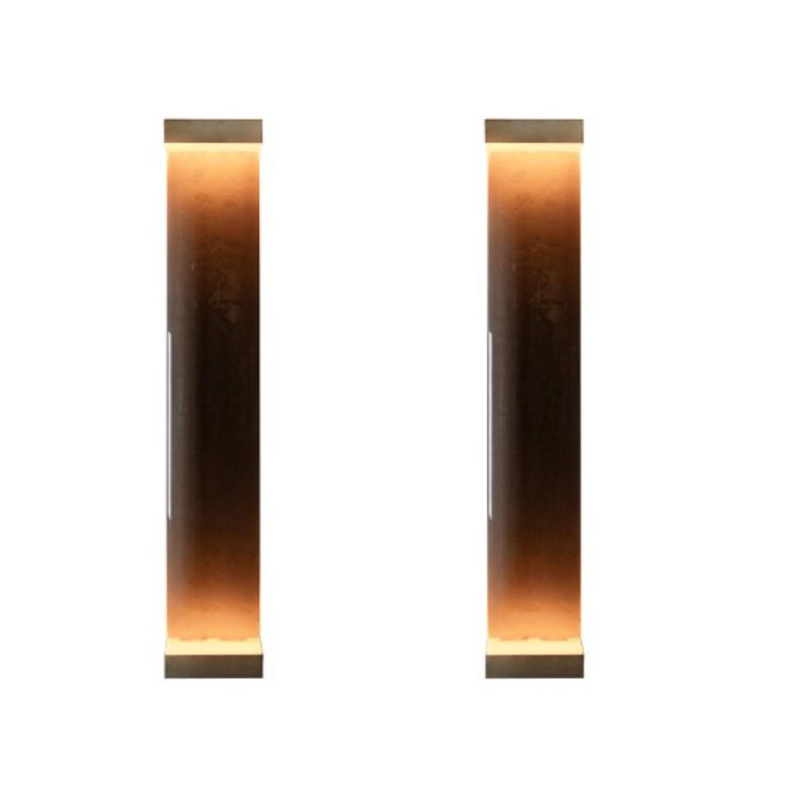 Set of 2 Jud wall lamps by Draga & Aurel
Dimensions: W 23, D 10, H 131.
Materials: resin and brass

All our lamps can be wired according to each country. If sold to the USA it will be wired for the USA for instance.

Inspired by minimalism,