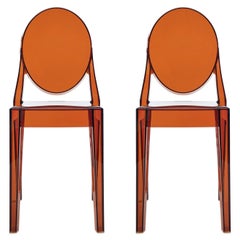Set of 2 Kartell Victoria Ghost Chairs in Amber by Philippe Starck