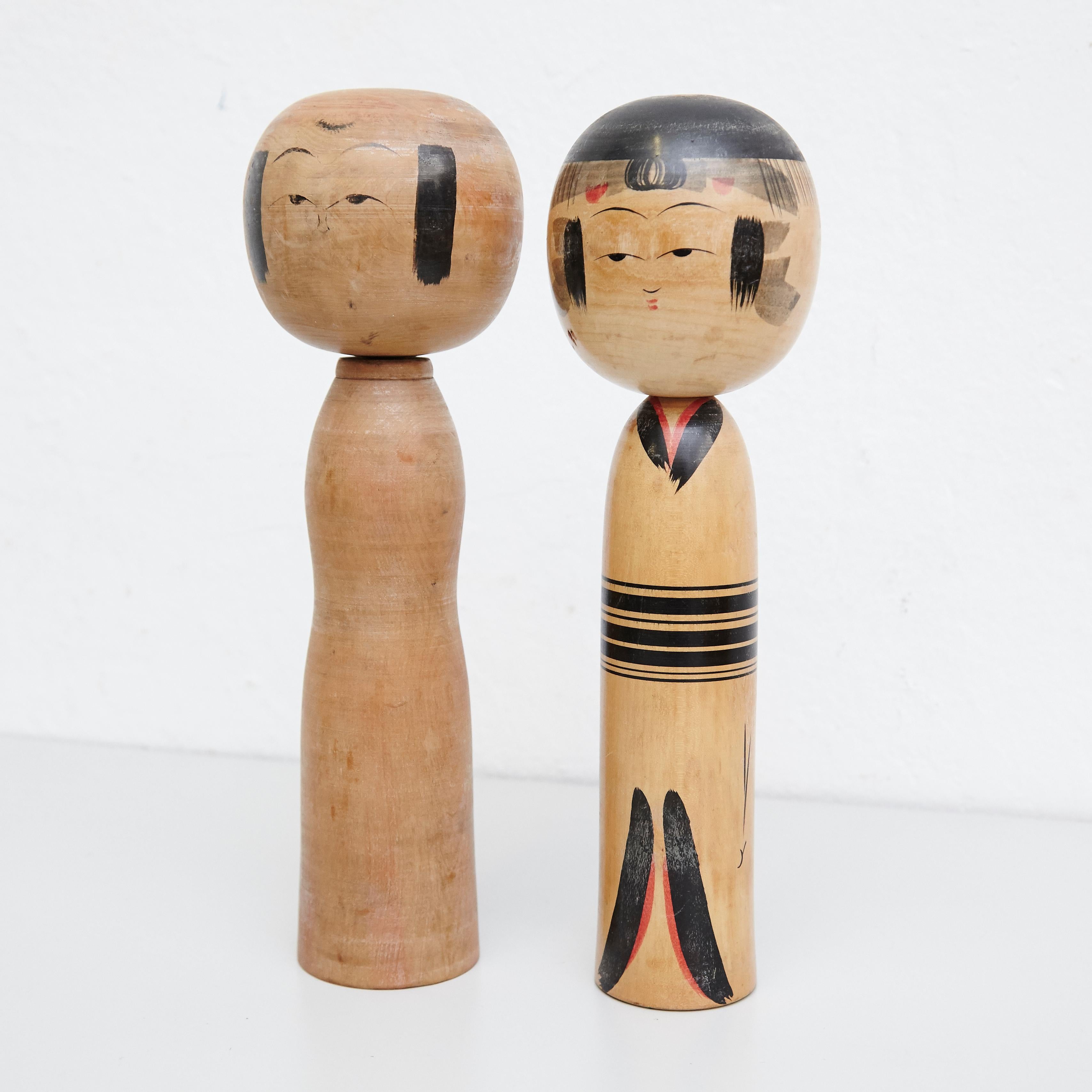 Japanese dolls called Kokeshi of the early 20th century.
Provenance from the northern Japan.
Set of 2.

Measures: 

31 x 9 cm
31 x 9,5 cm


Handmade by Japanese artisants from wood. Have a simple trunk as a body and an enlarged head. One