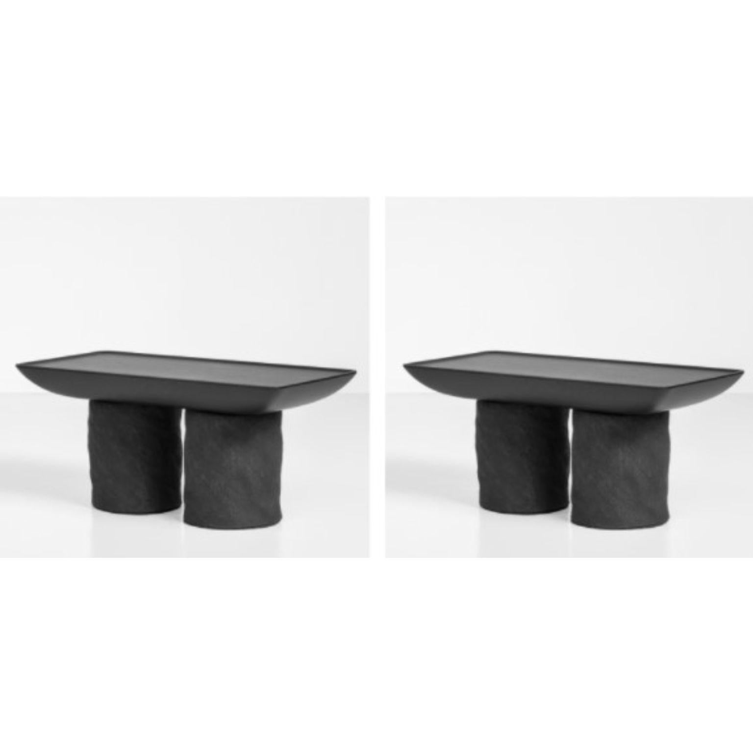Set of 2 Korotun coffee tables by Faina
Design: Victoriya Yakusha
Materials: Clay, Wood
Dimensions: W 75 x D 42 x H 35 cm

Almost carved in stone, minimalist coffee table with sharp outlines has sturdy character. With its authentic features KOROTUN