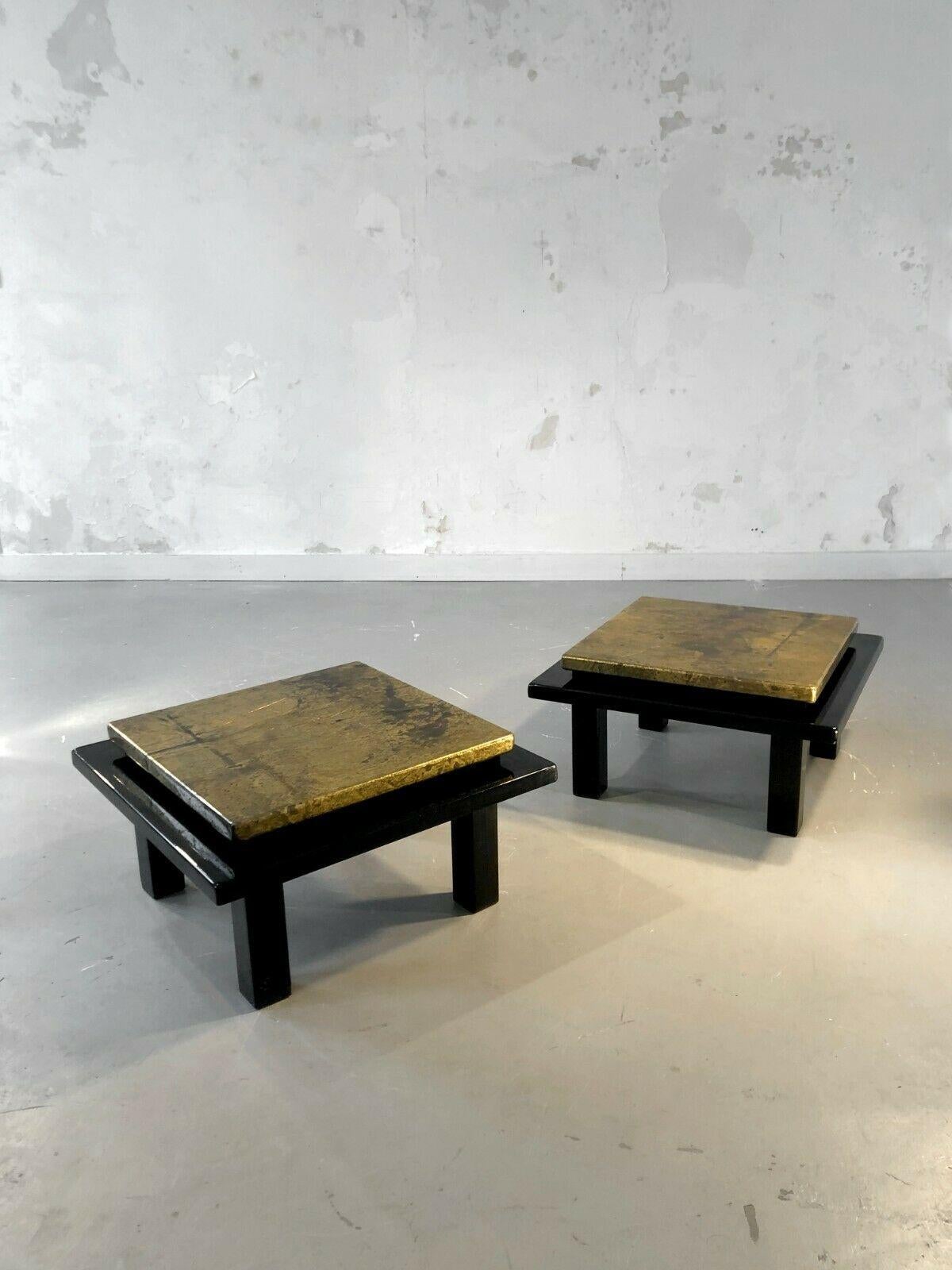 An elegant pair of rectangular nightstands, Art-Déco, Modernist, Cubist, Bauhaus, Shabby-Chic, square constructivist black lacquered wood structures, enhanced with beautiful gold leaf patinated tops, in the spirit of Aldo Tura, 1970.

We also offer