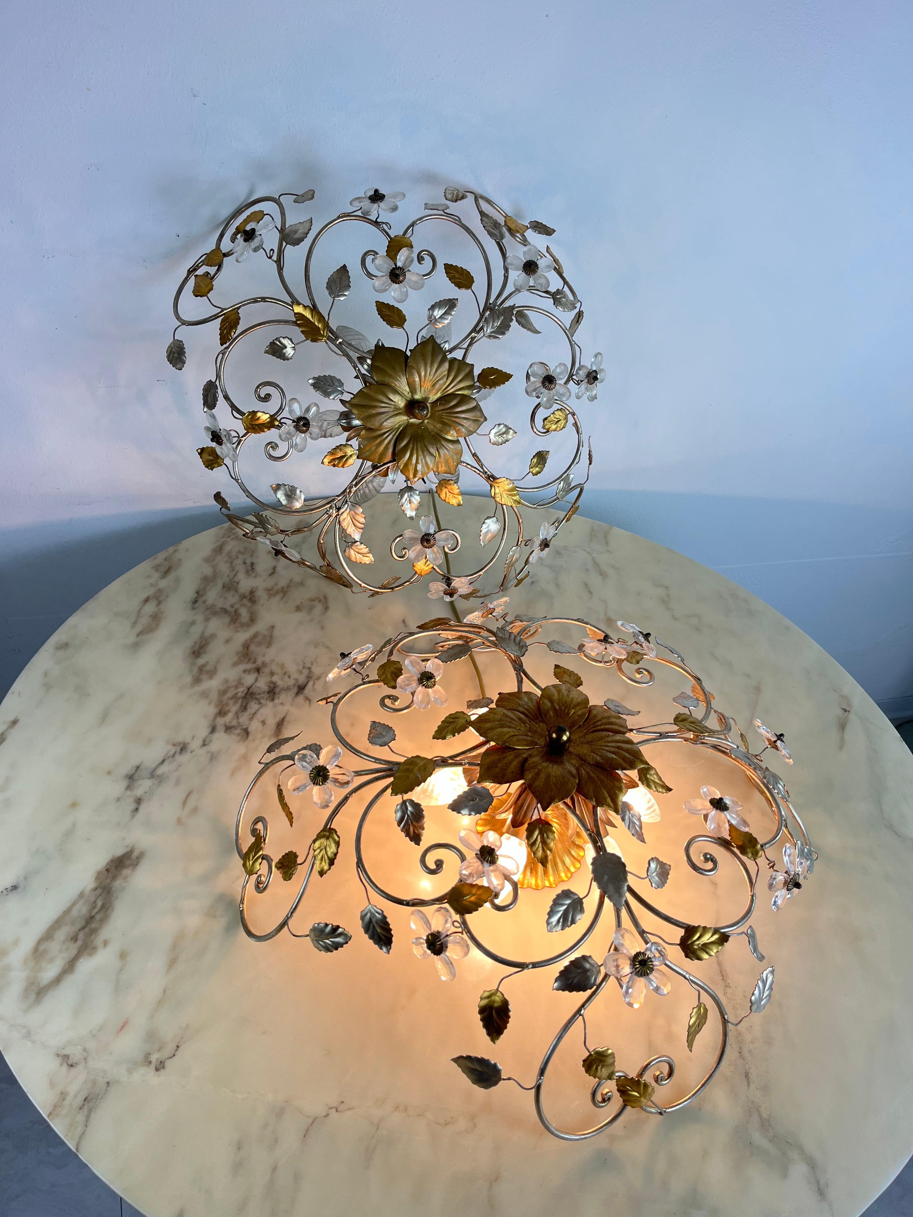 Set of 2 large Mid-Century Maison Baguès crystal and iron ceiling lights
Six lights each, intact and working, excellent condition, small signs of aging. E14 lamps.

We guarantee adequate packaging and will ship via DHL, insuring the contents against