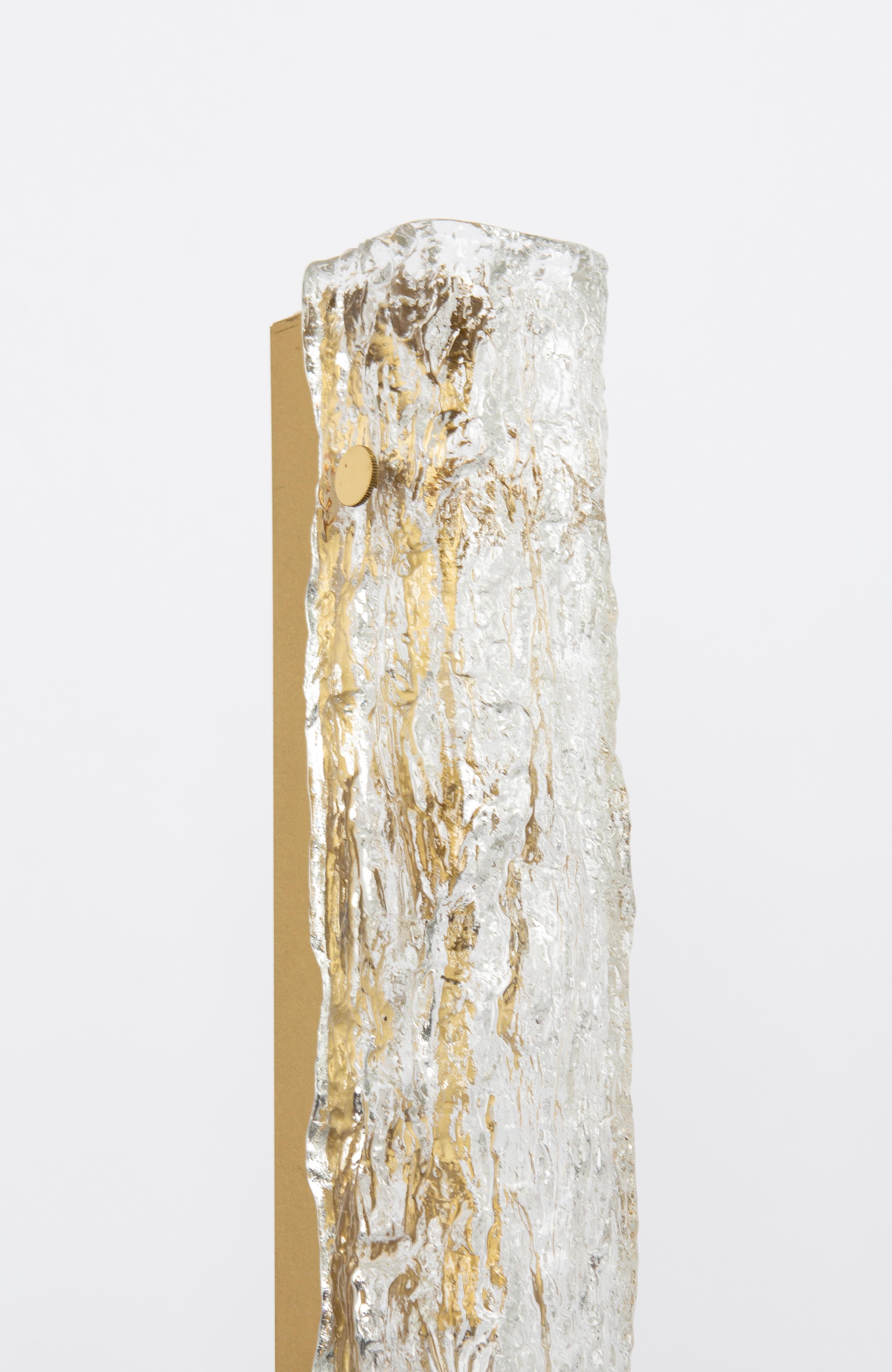 Gorgeous set of two Murano glass sconces by Kaiser Leuchten, Germany, circa 1970s. The frames are made of metal with a gold finish. These sconces are of heavy quality and in very good condition. They have been cleaned, well-wired, and are ready to