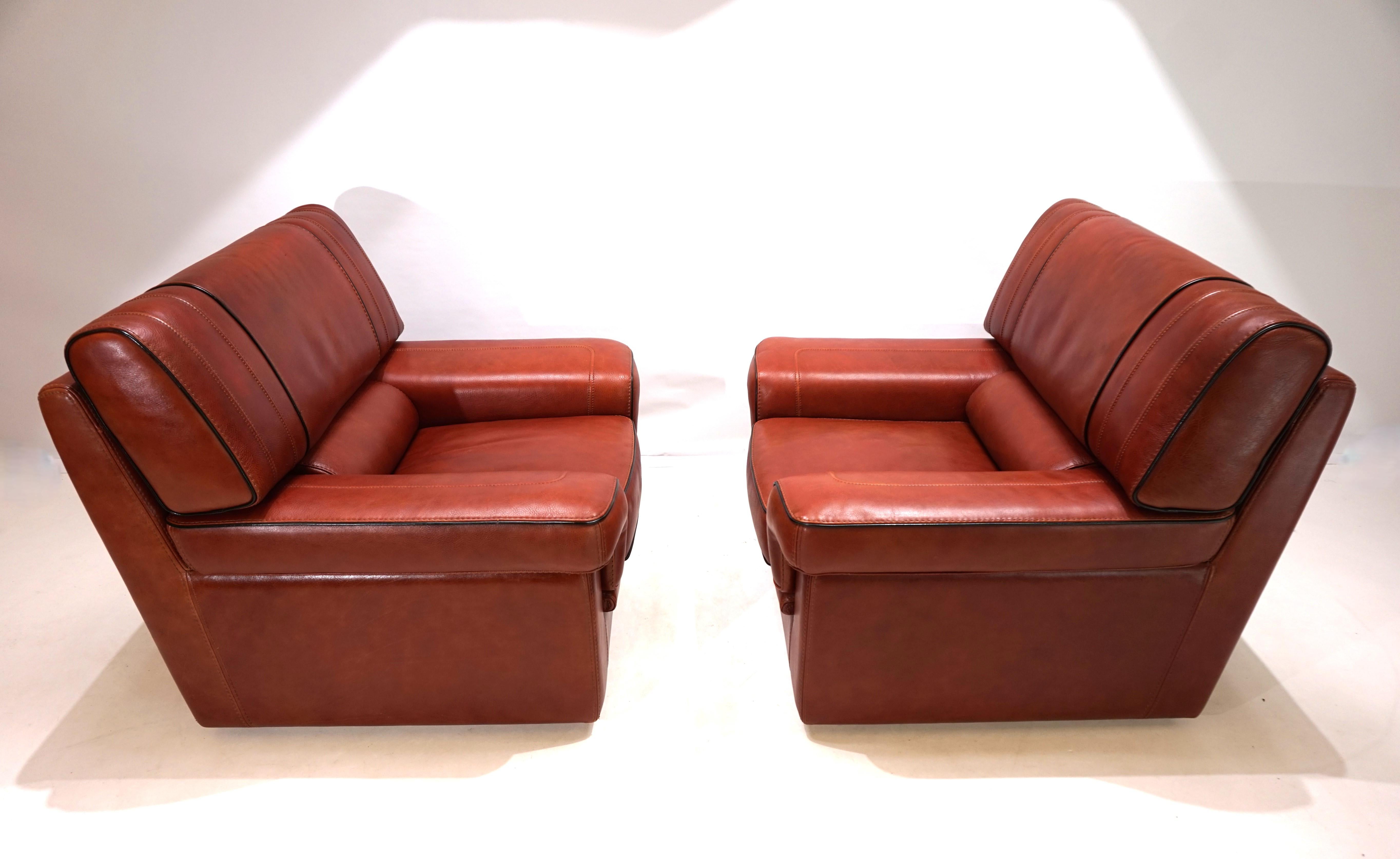 French Set of 2 leather armchairs, cognac coloured, 1990