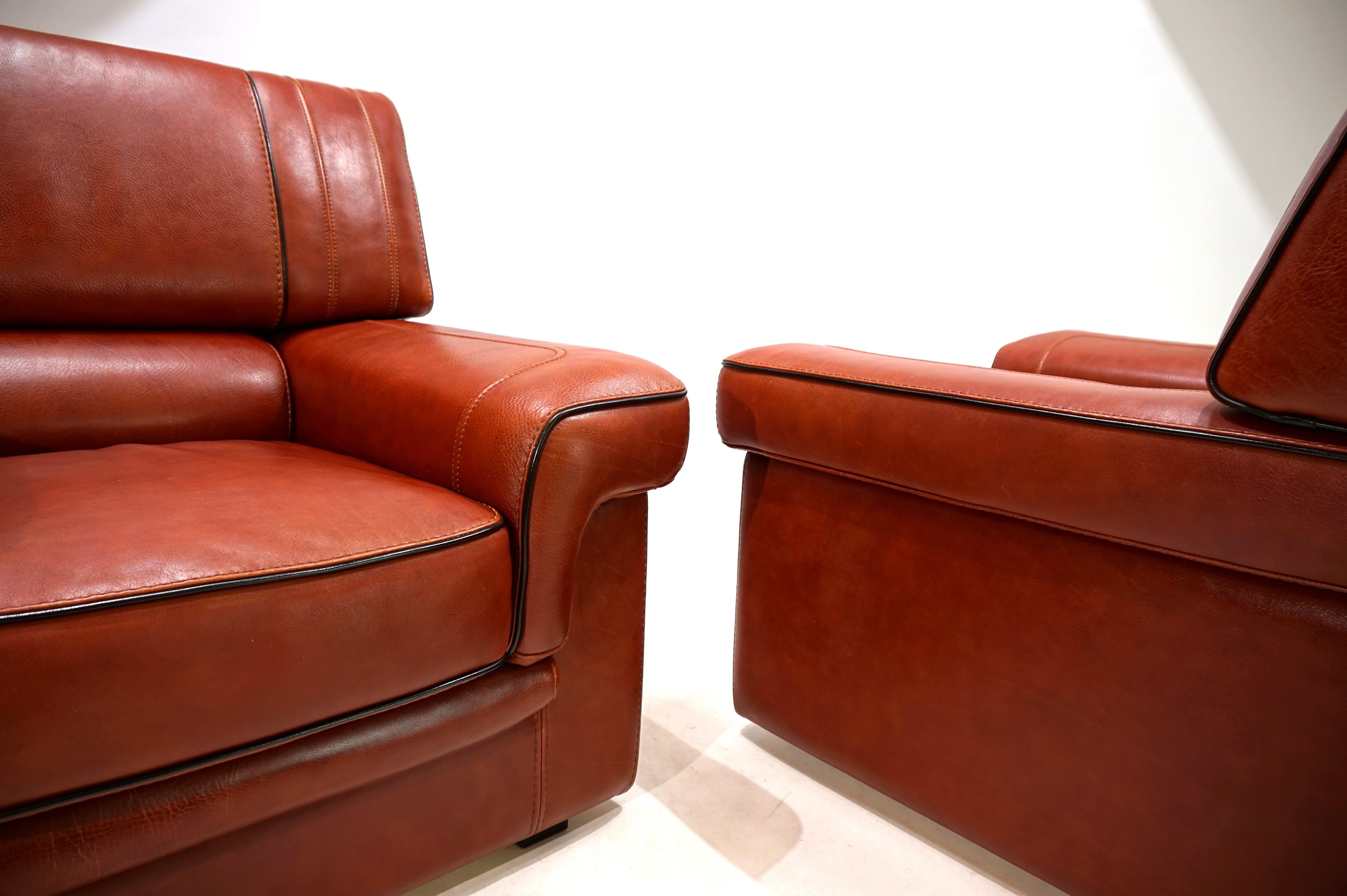 Leather Set of 2 leather armchairs, cognac coloured, 1990