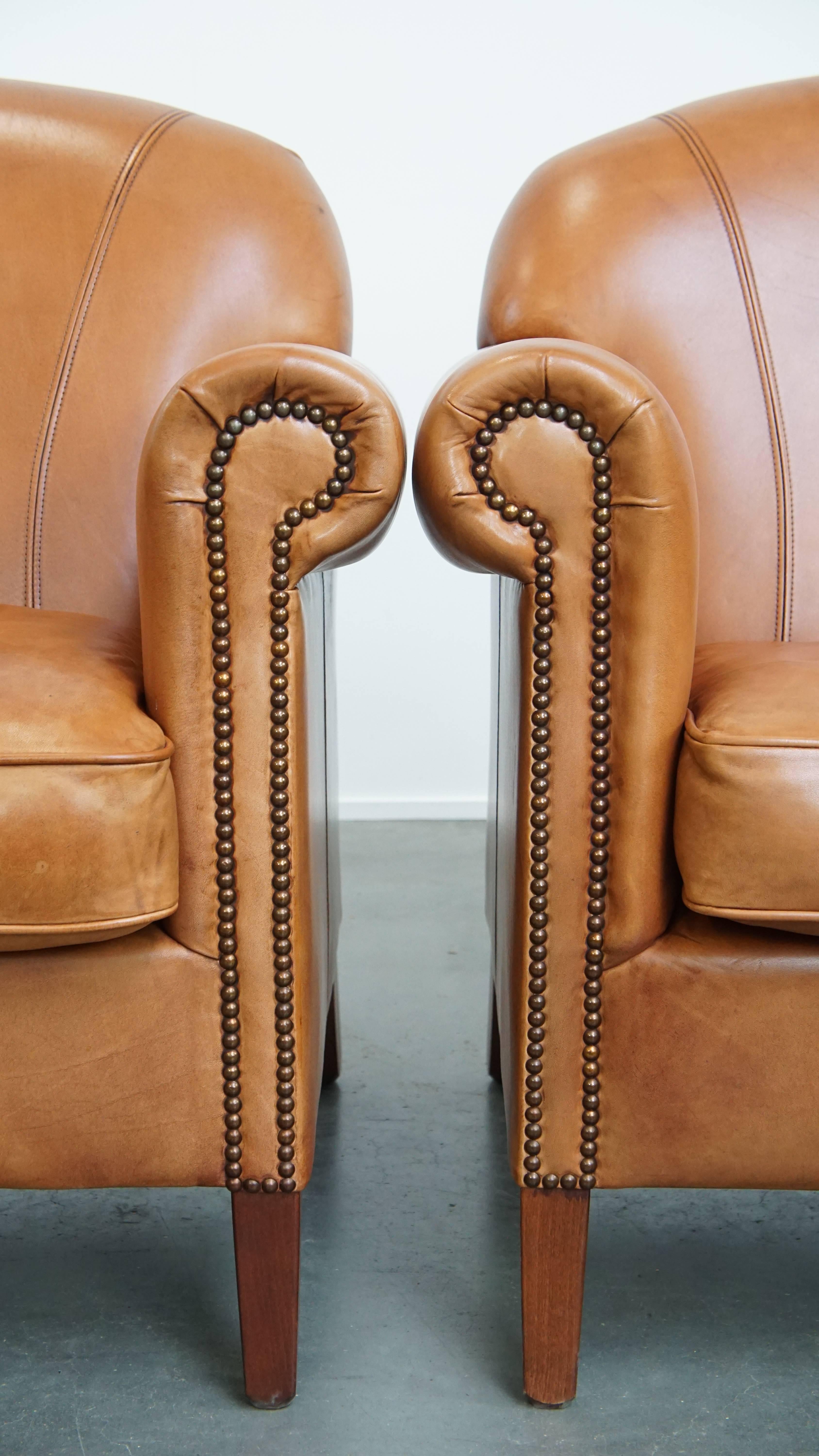 Set di 2 poltrone in pelle + pouf color cognac in vendita 4
