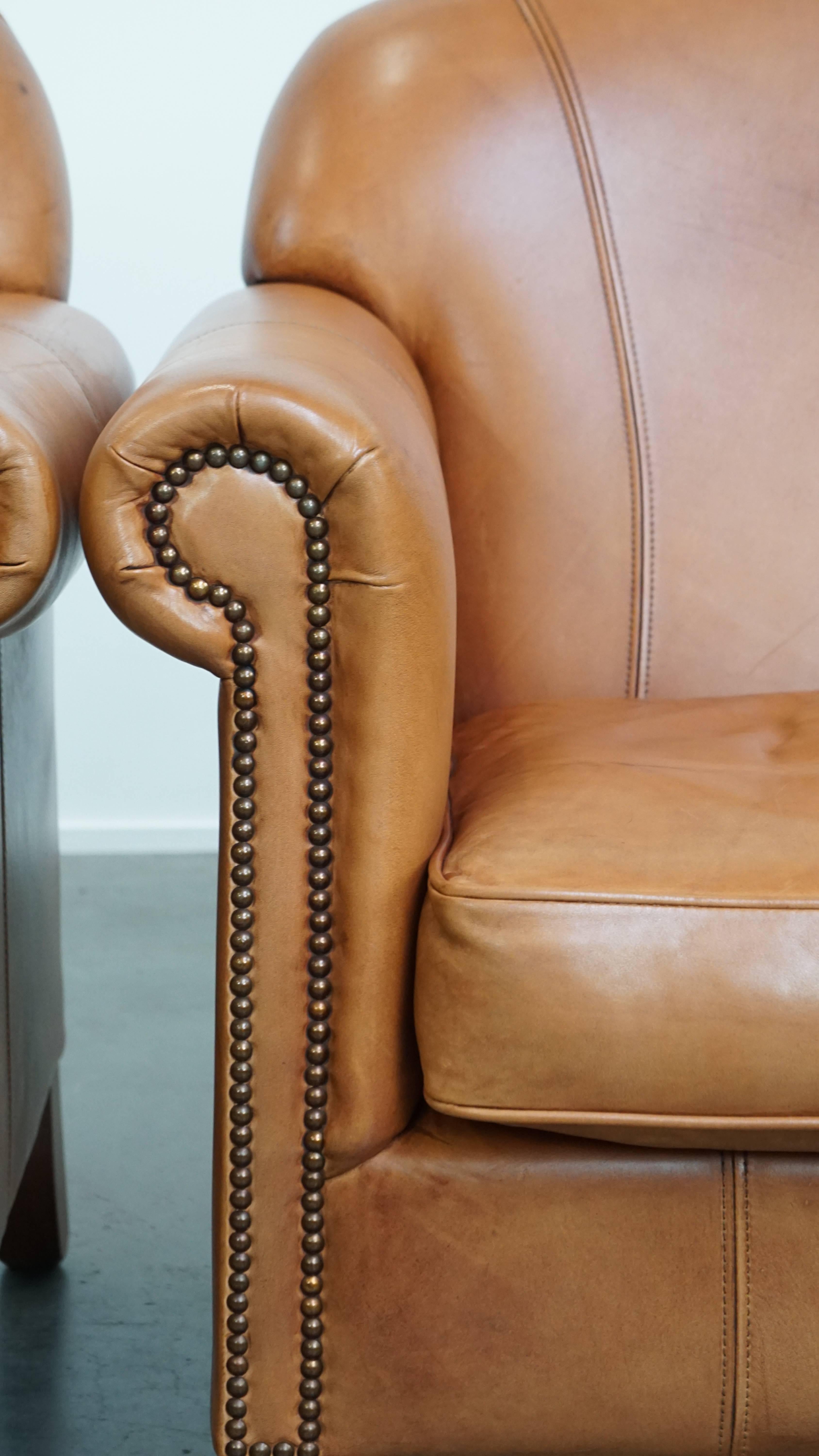 Set di 2 poltrone in pelle + pouf color cognac in vendita 8