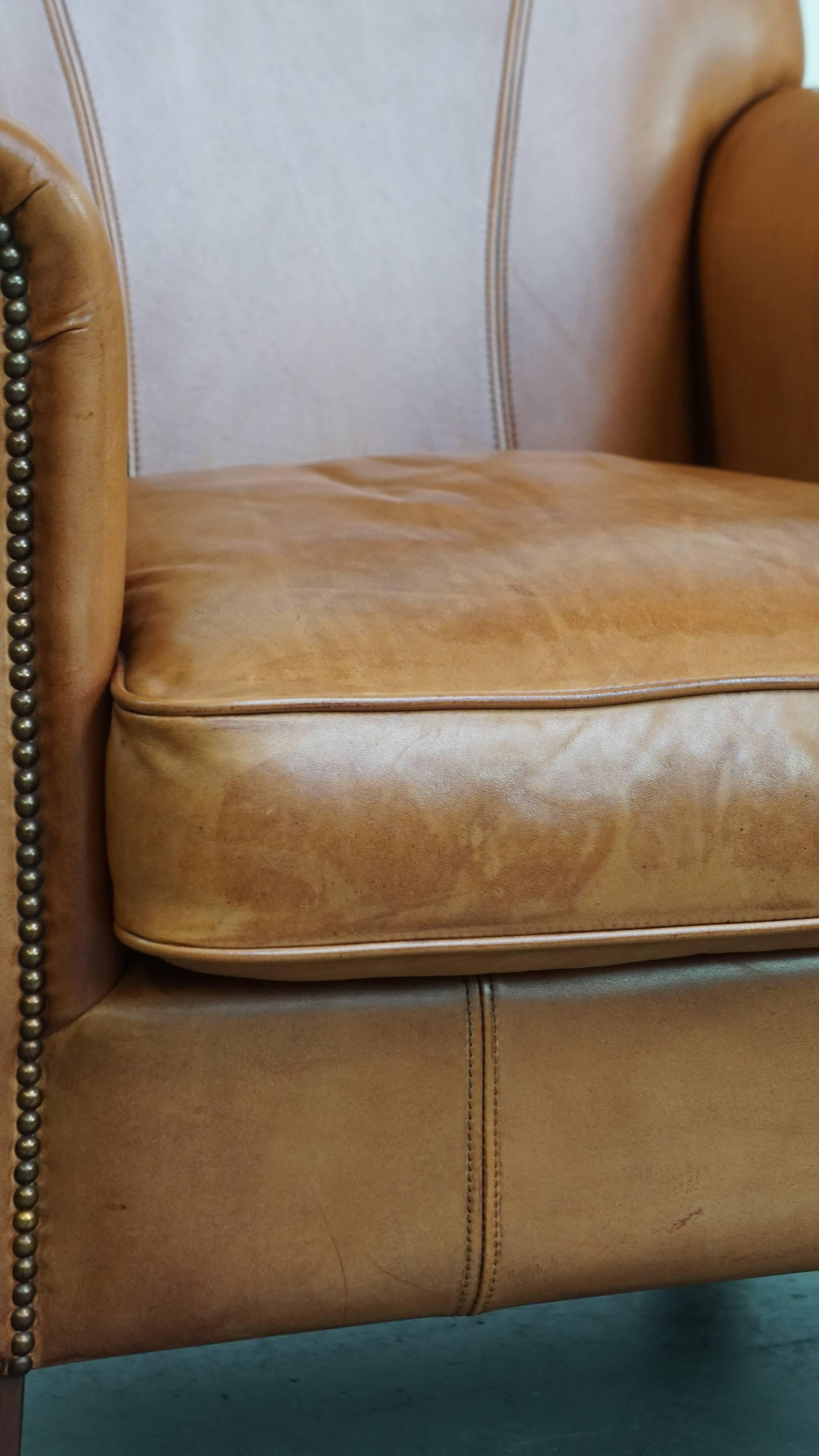 Set di 2 poltrone in pelle + pouf color cognac in vendita 9