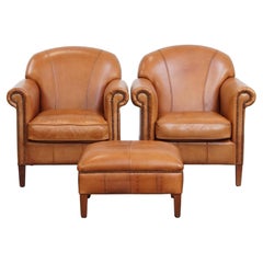 Set di 2 poltrone in pelle + pouf color cognac
