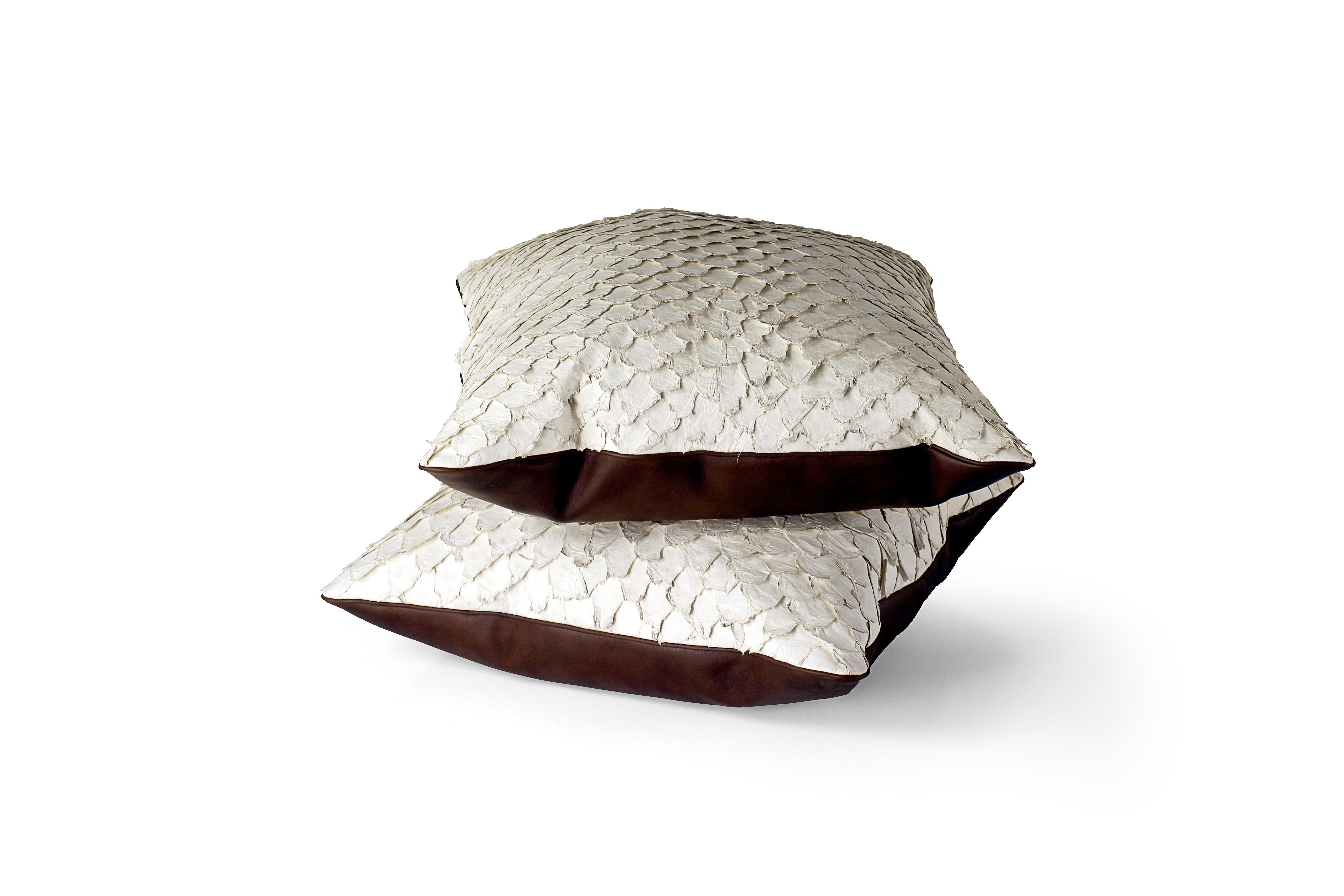 Set of 2 Leather Cushion, Exclusive fish leather off-white color and dark brown back, Large Size 24x24 in. Untrimmed scales

Fish leather luxury cushion. The fish skins comes from Brazilian food industry, it is the second largest river fish in the