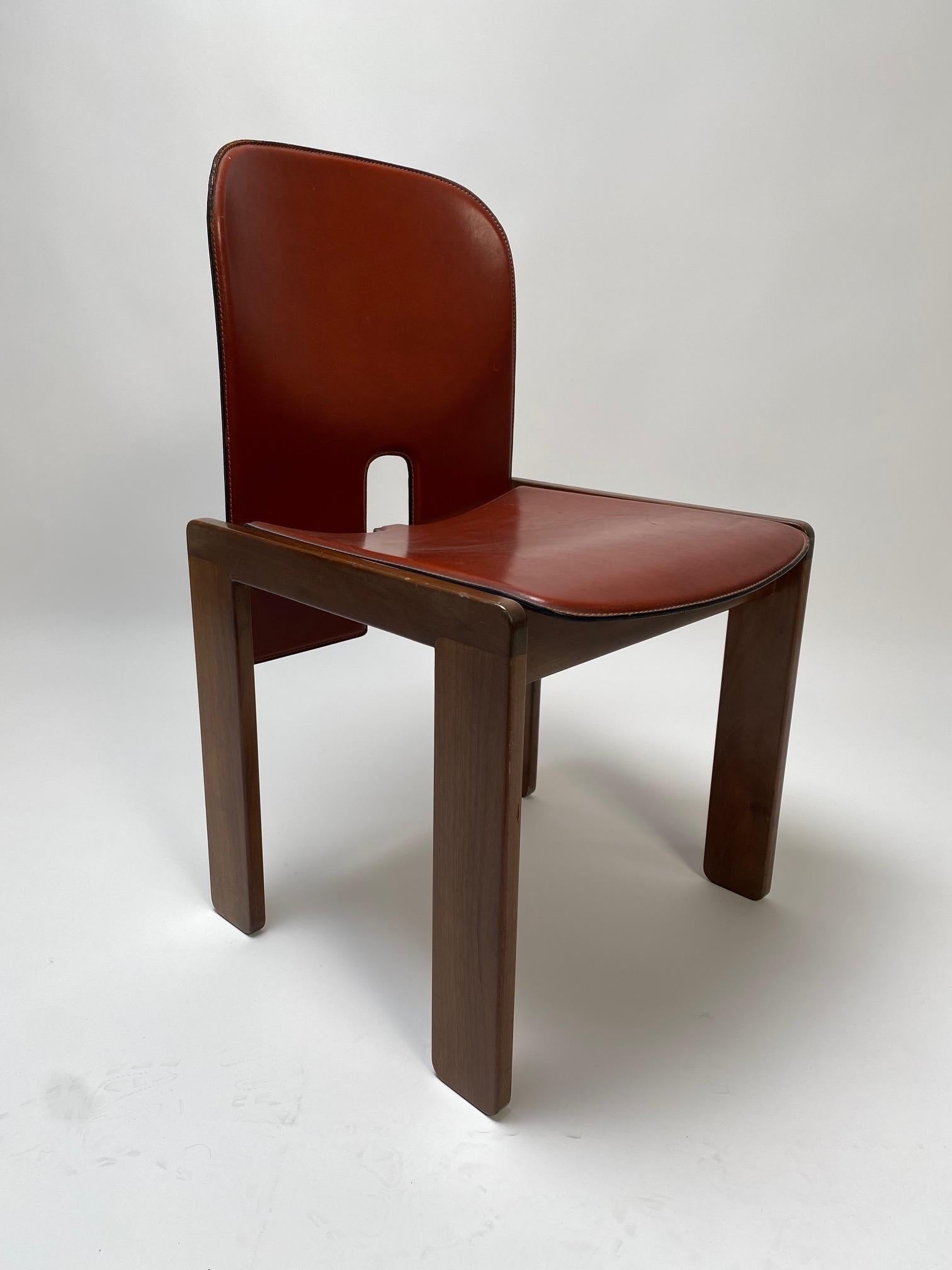 Afra and Tobia Scarpa, set of 2 leather and wood chairs made for Cassina, Italy, 1967.

It is one of the icons of Italian design, a perfect piece of furniture to be used as dining chairs but also for study or office.
The chairs are perfectly
