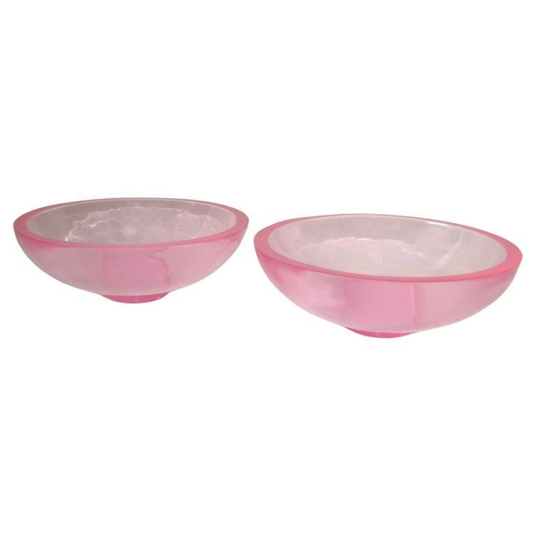 Set of two light pink, colorful polished Fiberglass Serving Bowls or Decorative Centerpieces.
The round shape plays upon the effect that resin has as light is refracted through the solid transparent parts.
Care Instructions: Dust with a soft, dry