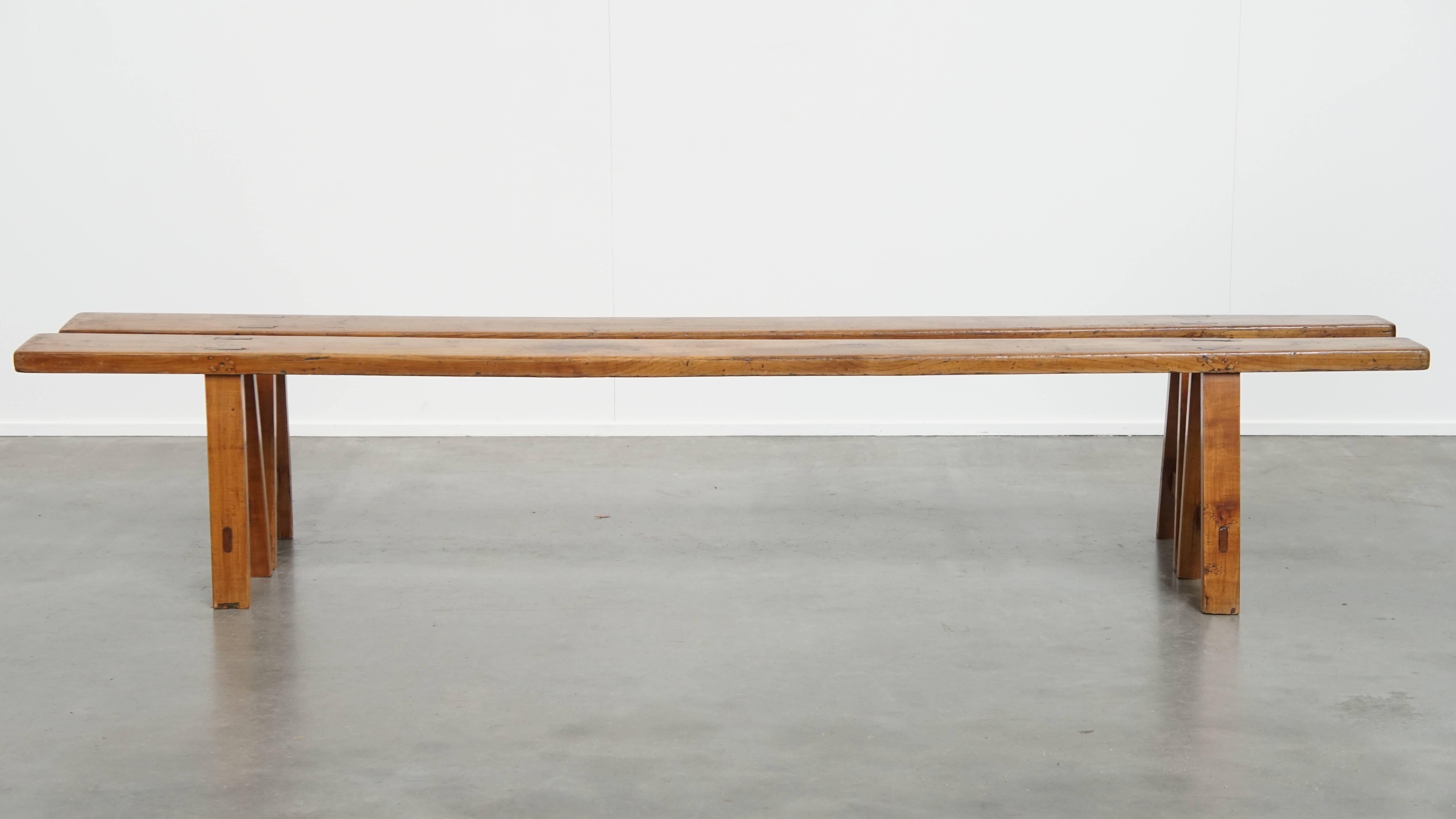Offered here is this stylish and timeless set of two long antique French hall benches / dining benches. 

For years, lovers of a charming and warm interior have known: a bench is always a beautiful and practical addition to nearly any interior
