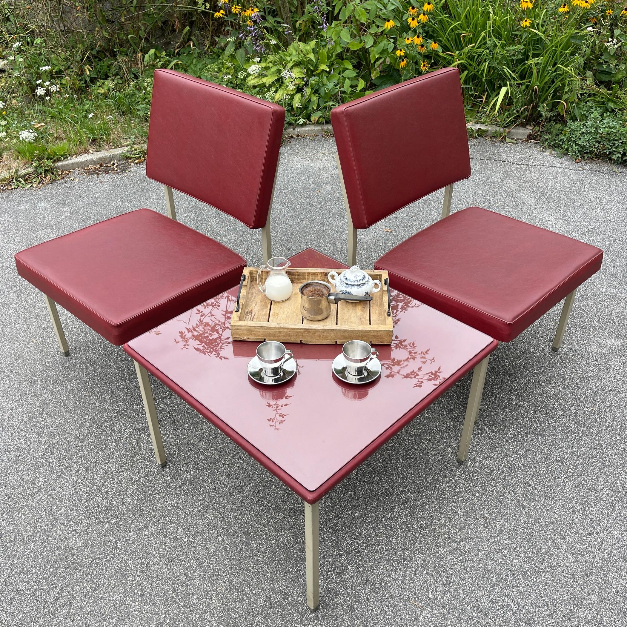 Rare set of vintage Anonima Castelli armchairs and coffee table, fantastic metal structure, with original leatherette.
Made in Italy in the 1950s.
Excellent vintage condition. All items have a label Anonima Castelli.
Dimensions:
Table: height 45