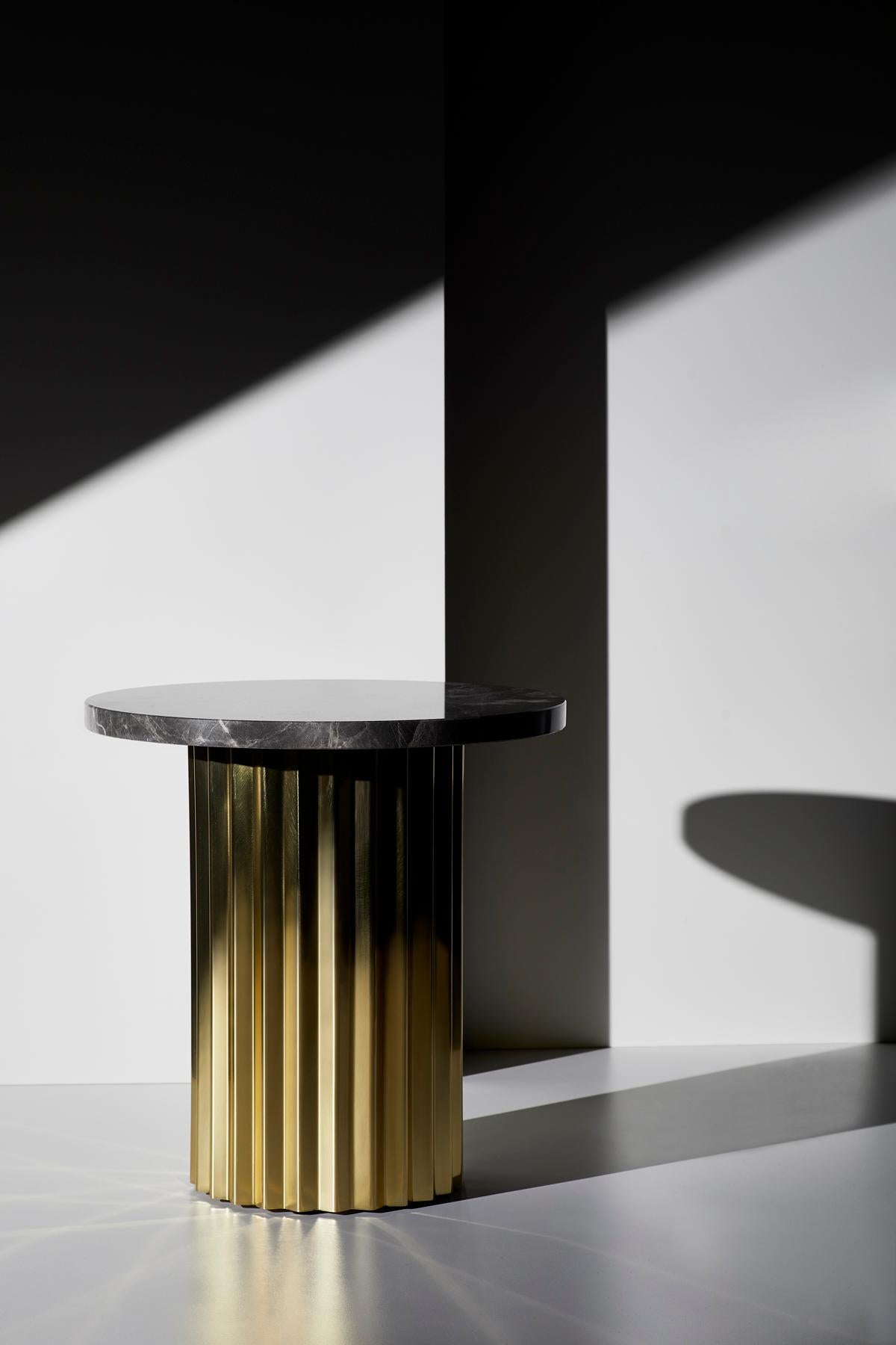 Set of 2 marble tables by Lisette Rützou.
Dimensions:
D 60 x H 41 cm
D 40 x H 41 cm
Materials: Marble, oak tabletop, brass column.


 Lisette Rützou’s design is motivated by an urge to articulate a story. Inspired by the beauty of materials,