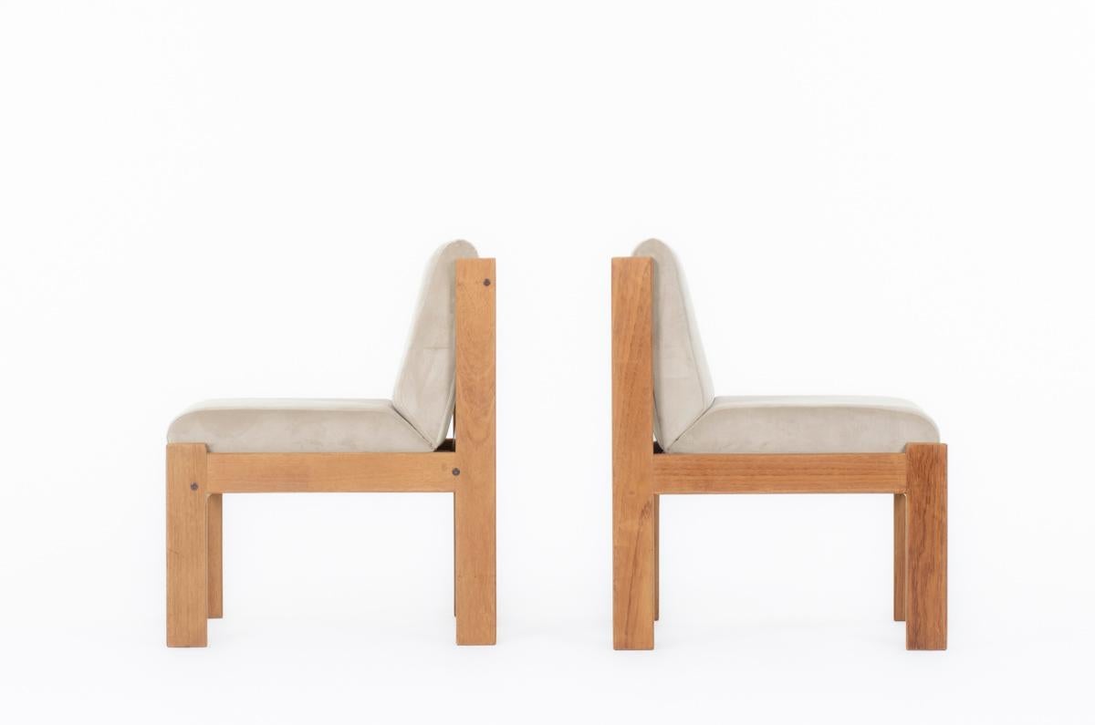 Set of 2 low chairs designed by French cabinetmaker: Andre Sornay during the 60s in France
Structure with four feet in mahogany completed with white laminate panels (back)- connected with rod system
Cushions in foam covered by brown velvet fabric