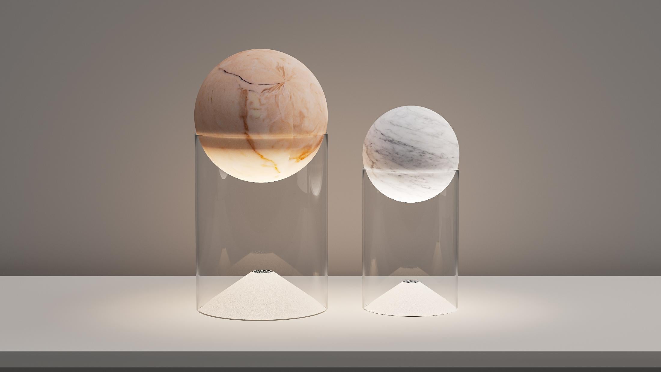 Set of 2 Lunar table lamps by Studio Roso
Dimensions: D15 x H29.5 cm // D10 x H22.5 cm
Material: Stone (marble or sandstone), glass
Weight: 6.3 kg 

All our lamps can be wired according to each country. If sold to the USA it will be wired for