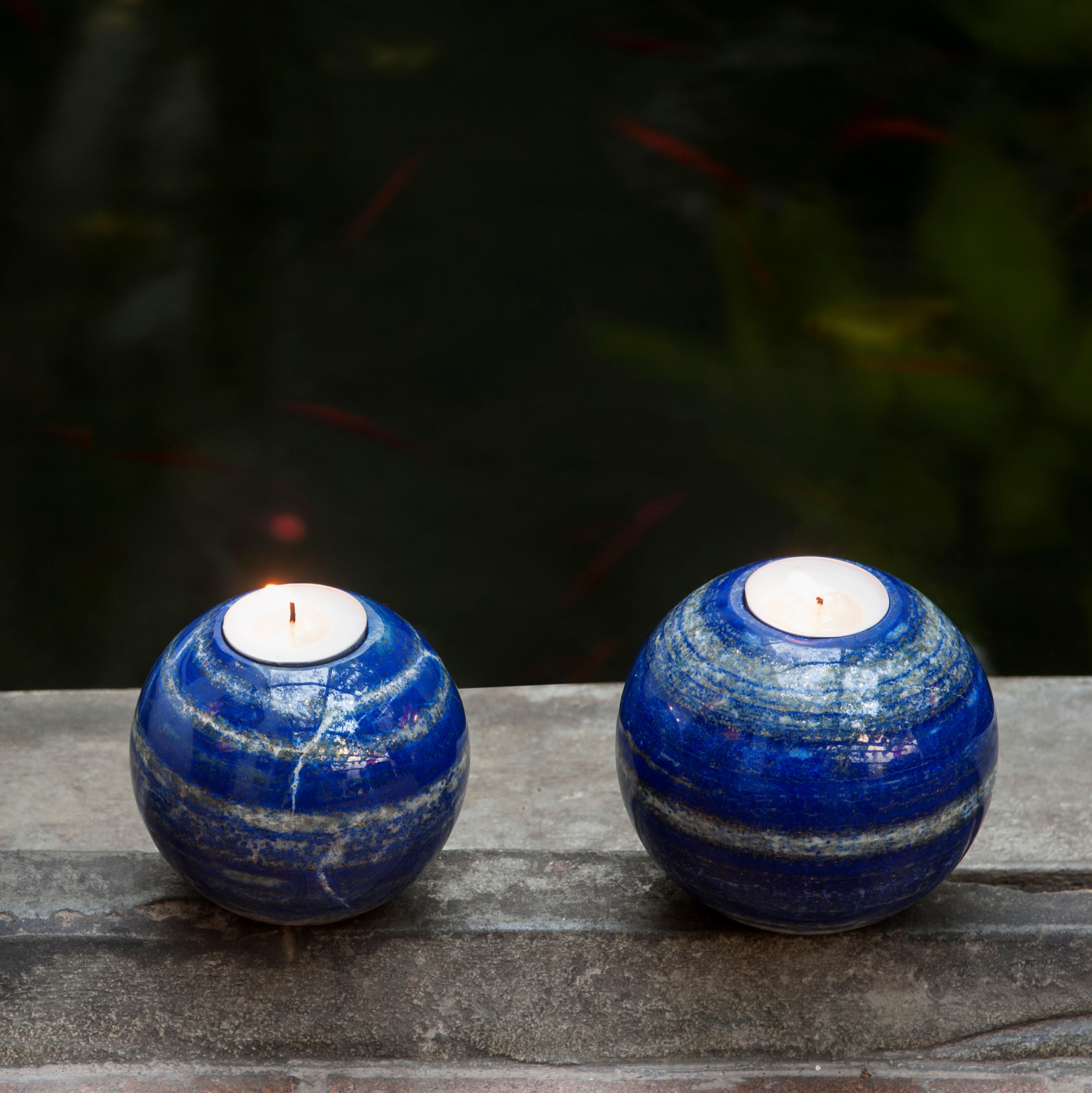 Majorelle candleholder by Studio Lel
Dimensions: D 10 x H 9 cm / D 9 x H 9 cm
Materials: Lapis Lazuli

Lél is an artistic collective dedicated to preserving and evolving the 16th century Florentine and Mughal art of hand-crafted stone inlay.