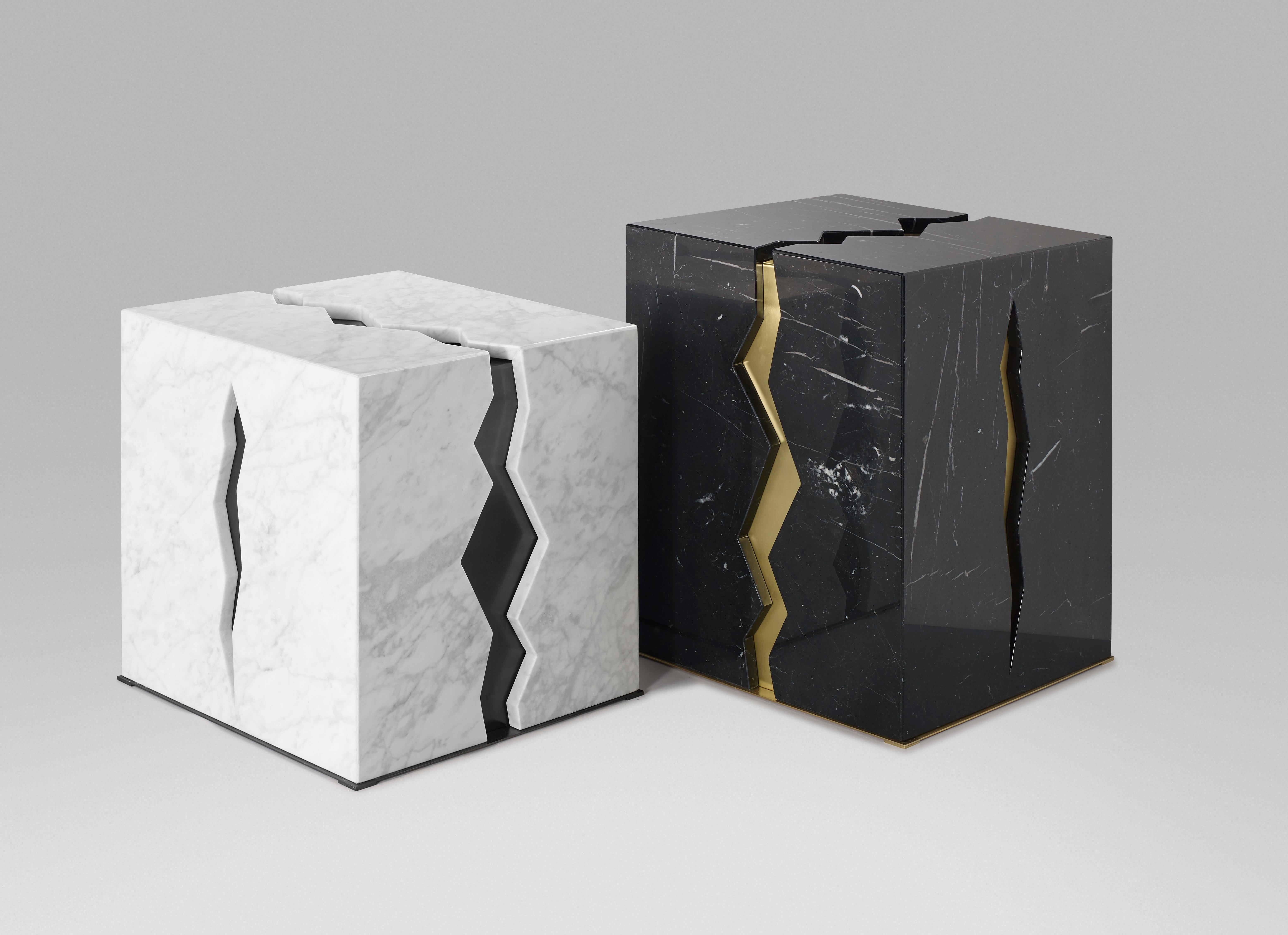 Set Of 2 Marble Crepa Coffee Tables by Atelier Terrai
Dimensions: D 45 x W 45 x H 55 cm.
Materials: Carrara marble, Nero Marquina marble, and satin brass.

A powerful lightning bolt of satin brass cracks the sturdy block of polished black Marquina