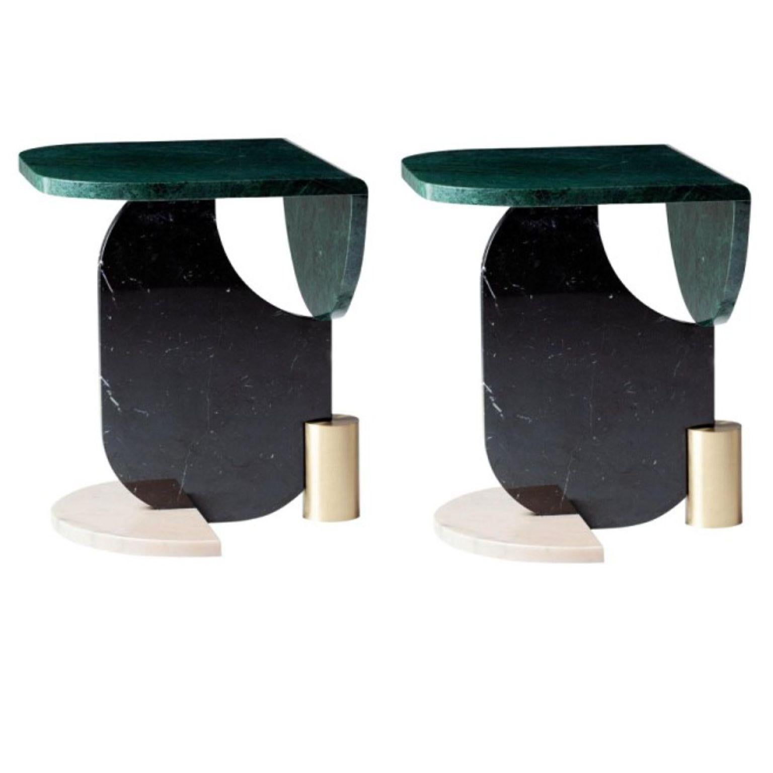 Set of 2 marble side tables by Dooq
Measures: W 52 cm 20”
D 60 cm 24”
H 61 cm 24”

Materials: top, oval and half-circle base marble:
Guatemala green, estremoz white, estremoz
rose, Carrara, Nero Marquina, Emperador
metal base polished/satin