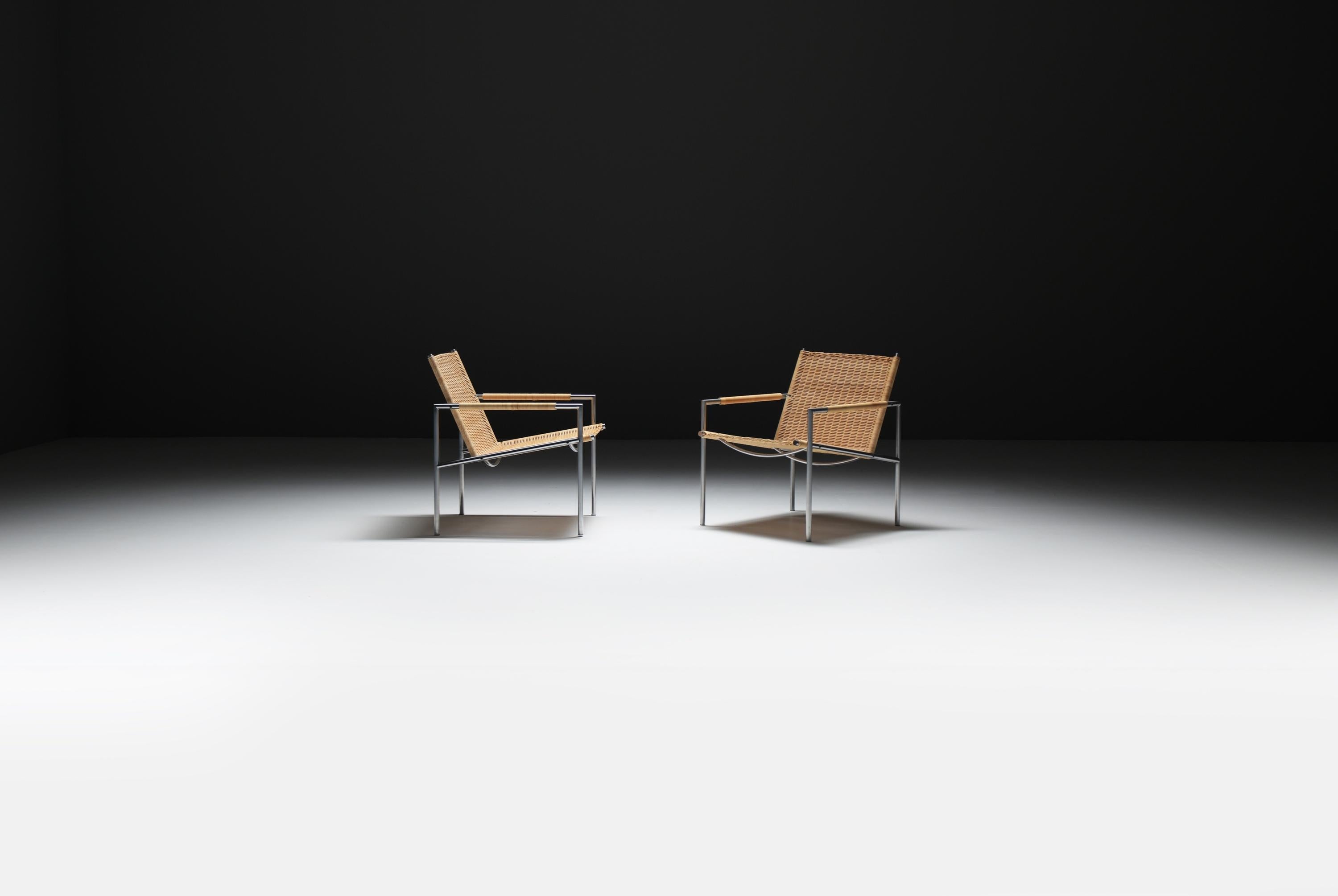 
SZ 01 Armchair - Martin Visser - SPECTRUM
SZ 01 Fauteuil by Martin Visser for ‘t Spectrum, 1960
Rattan Woven Lounge Chair on a Brushed Steel Frame

Designed in 1960 by Dutch functionalist Martin Visser, the SZ 01 chair is a landmark in the lineage