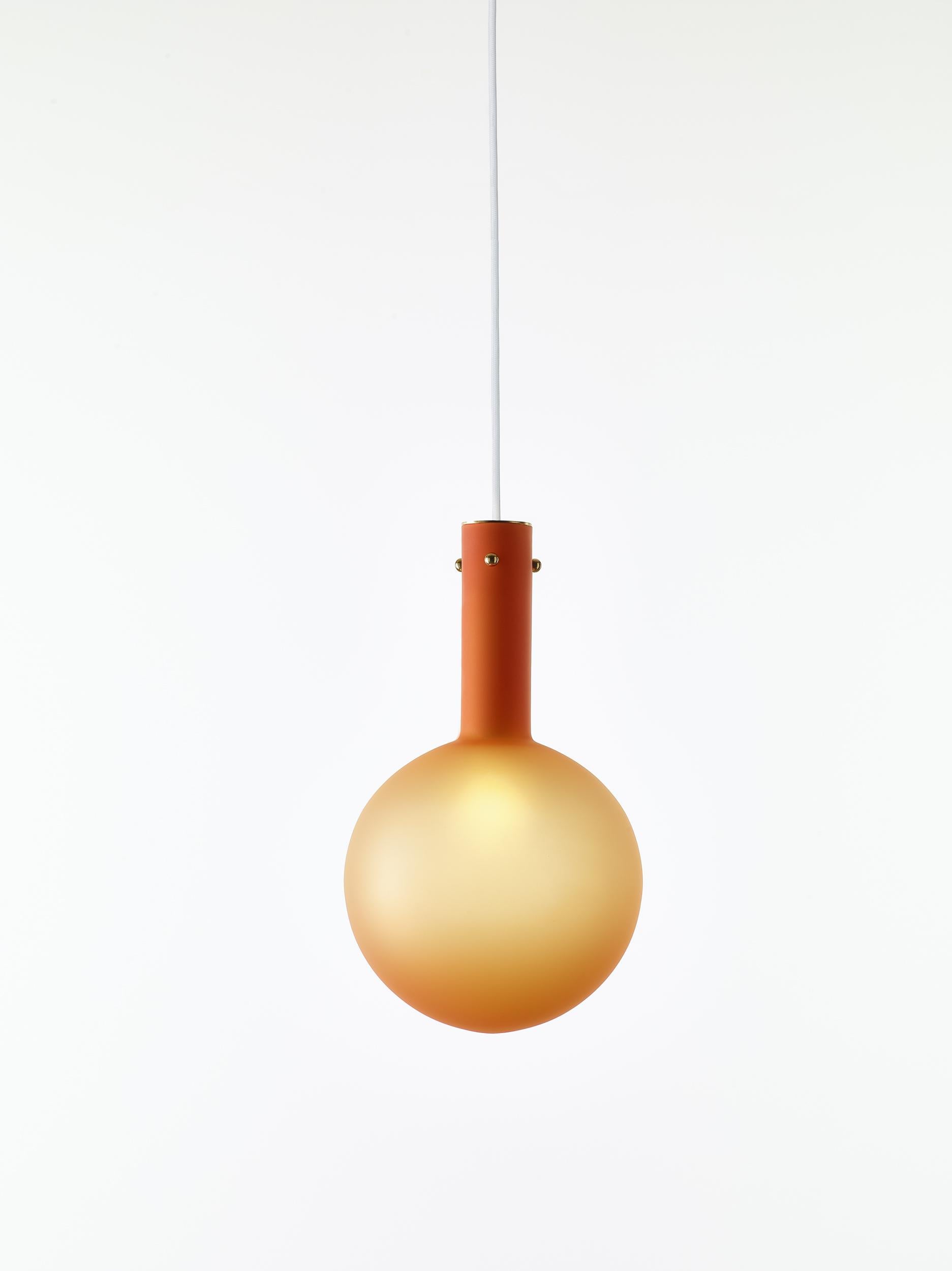 Set of 2 Matte Orange Sphaerae pendant lights by Dechem Studio
Dimensions: D 20 x H 180 cm
Materials: brass, metal, glass.
Also available: different finishes and colours available.

Only one homogenous piece of hand-blown glass creates the main