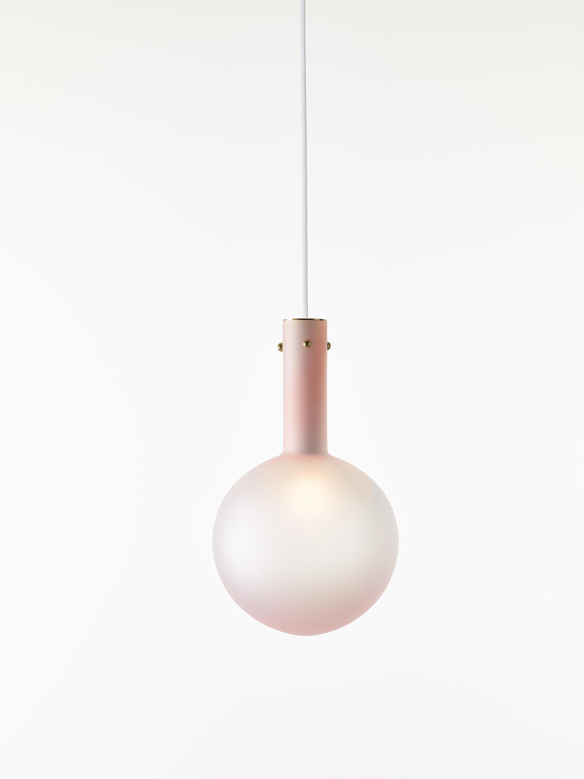 Set of 2 matte pink sphaerae pendant lights by Dechem Studio
Dimensions: D 20 x H 180 cm
Materials: brass, metal, glass.
Also available: different finishes and colours available.
Only one homogenous piece of hand blown glass creates the main body