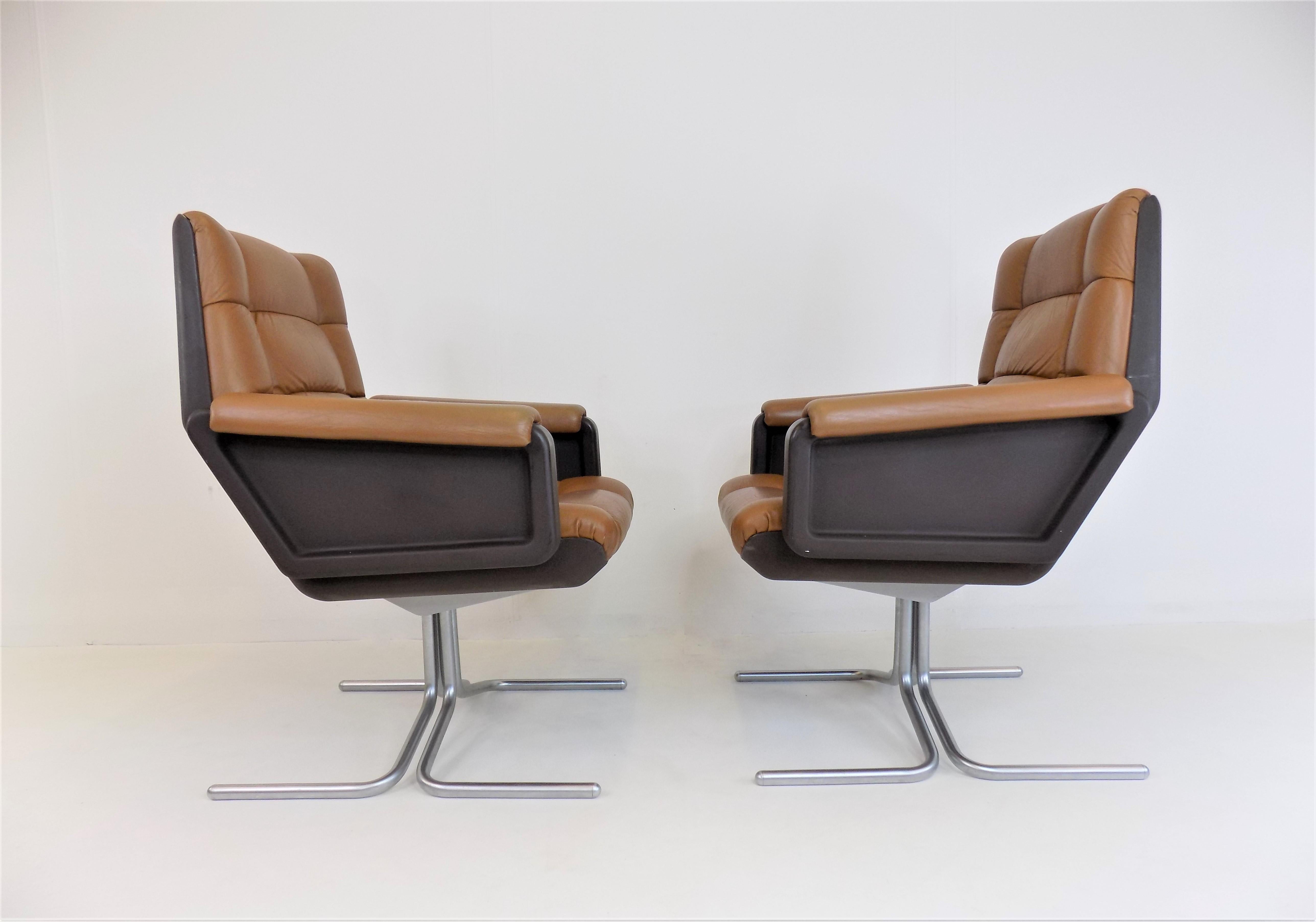 Space Age Set of 2 Mauser Seat 150 leather armchairs by Herbert Hirche