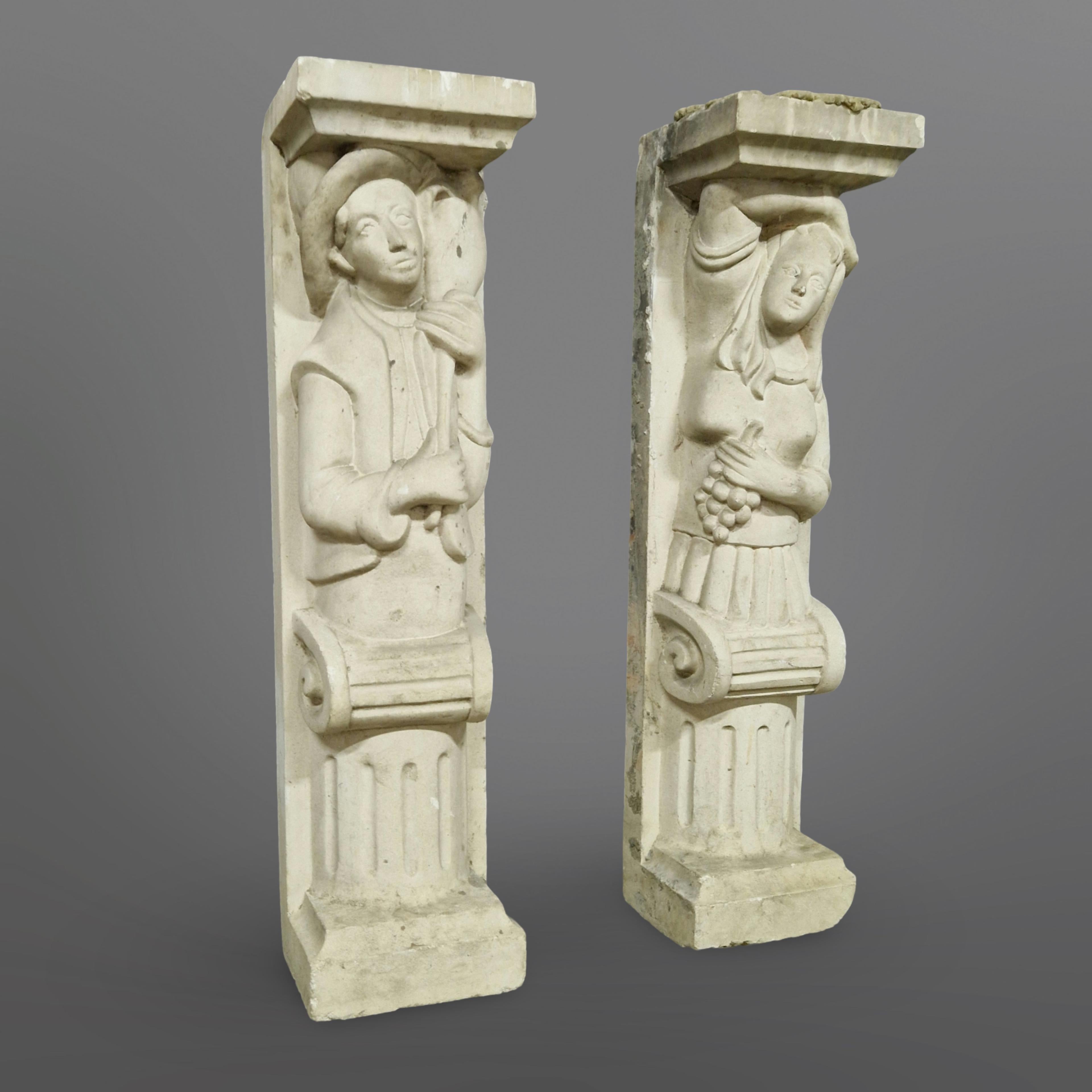 Set of two sculpted architectural columns. They are made from some kind of cast stone or plaster. They were probably meant as fireplace columns seeing the height of 104cm. They have concrete residue so they were actually used. Unfortunately we have