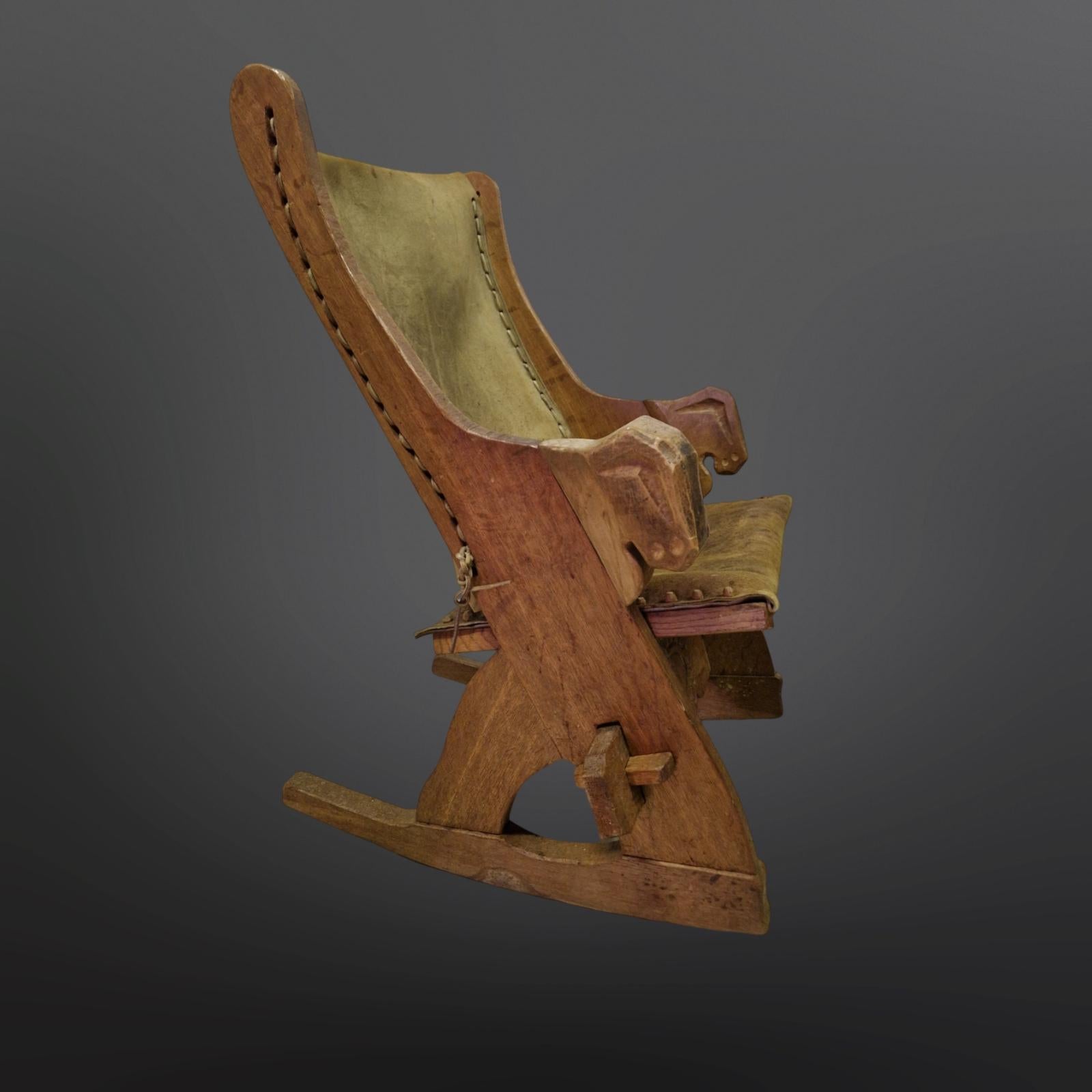 Set of 2 medieval style rocking chairs in oak and leather, Netherlands 1960s 2