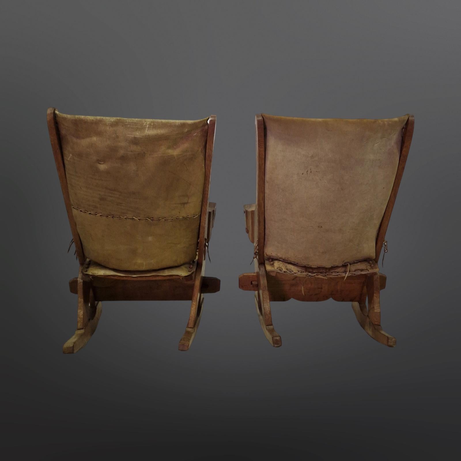 Brutalist Set of 2 medieval style rocking chairs in oak and leather, Netherlands 1960s