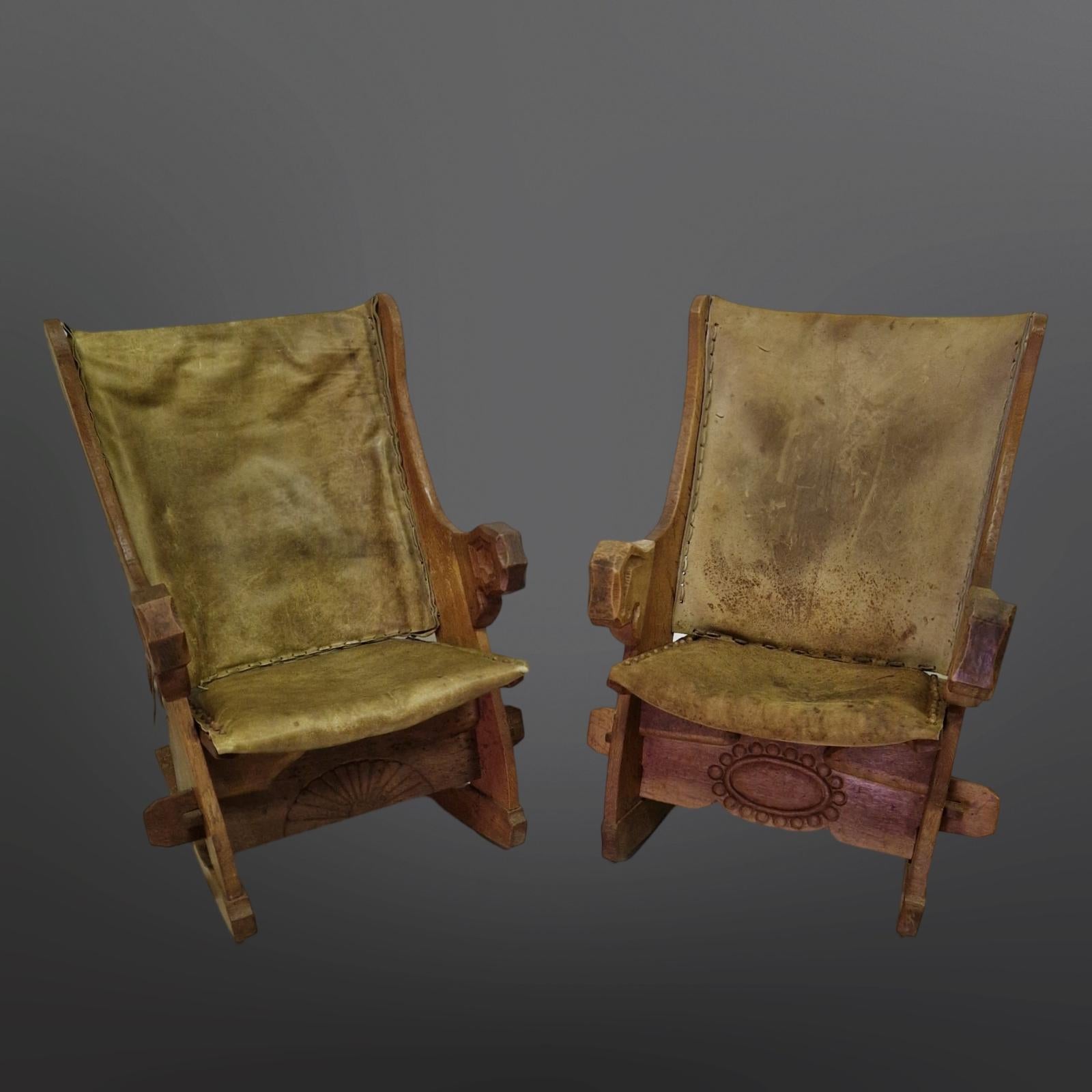 Hand-Carved Set of 2 medieval style rocking chairs in oak and leather, Netherlands 1960s