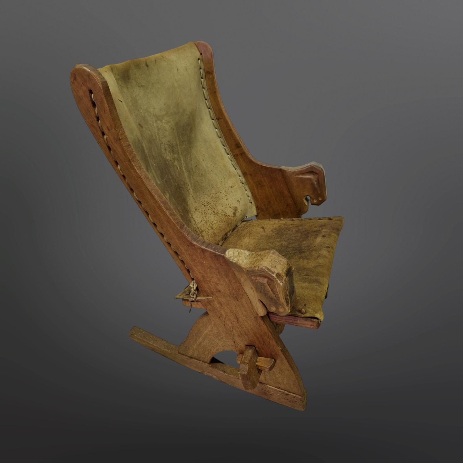 Set of 2 medieval style rocking chairs in oak and leather, Netherlands 1960s 1
