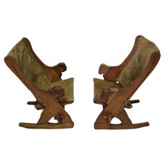 Set of 2 medieval style rocking chairs in oak and leather, Netherlands 1960s